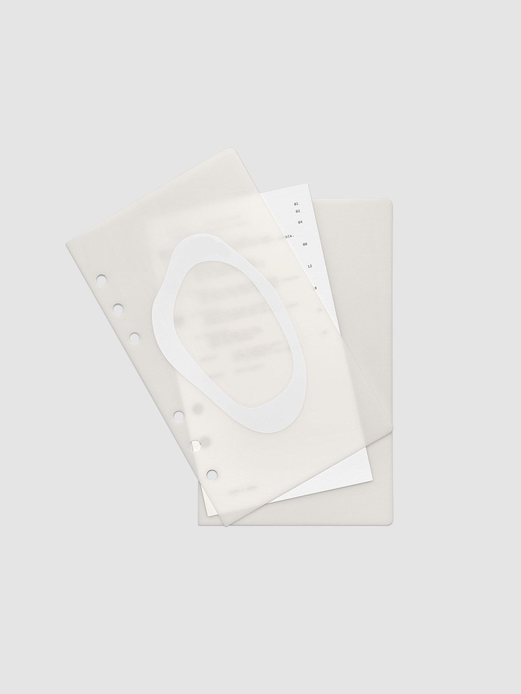 Continuation Planner Cover + Dashboard Set in Personal. Milky white frosted plastic cover with a spot gloss organic shape over a black-printed paper dashboard. Image 3 of 3.