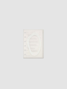 Continuation Planner Cover + Dashboard Set in Pocket. Milky white frosted plastic cover with a spot gloss organic shape over a black-printed paper dashboard. Image 1 of 3.