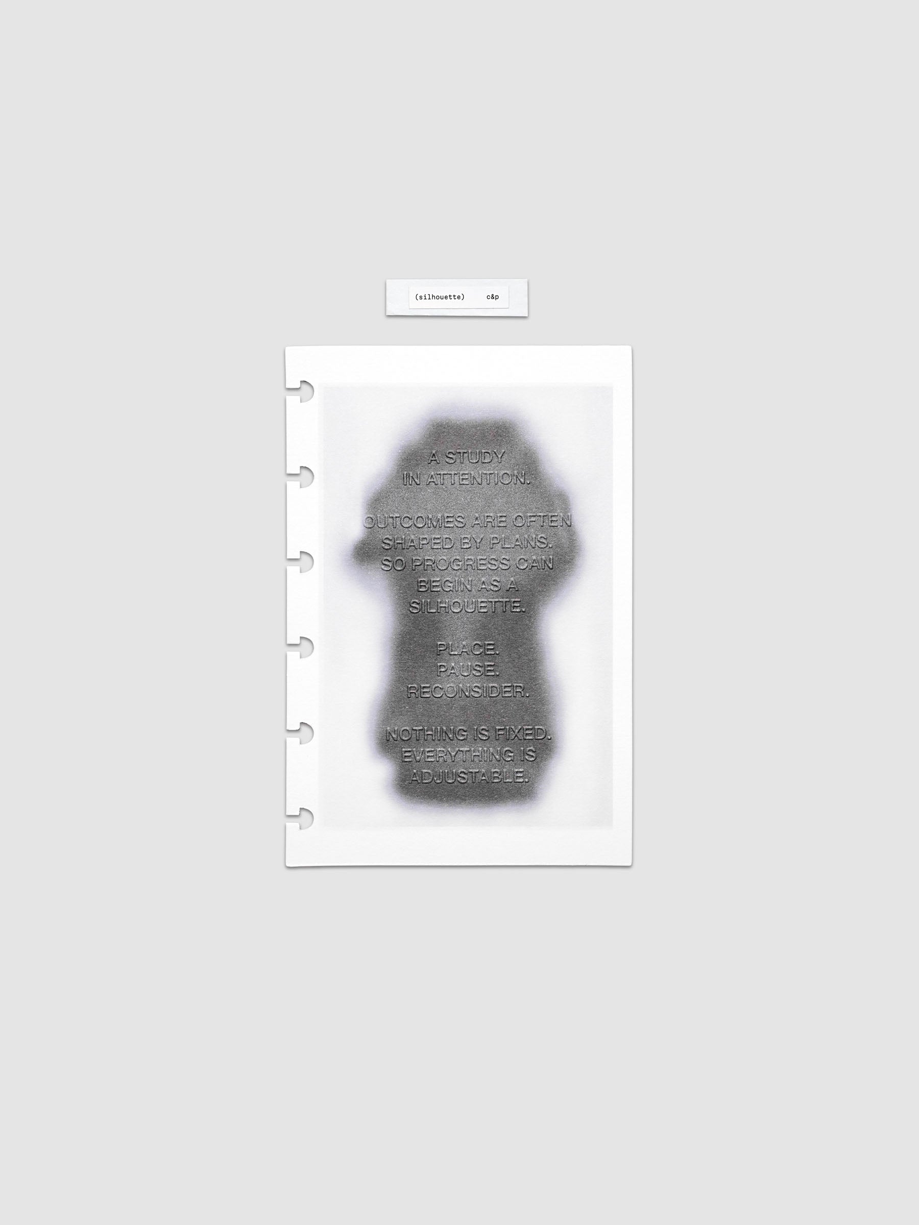 Silhouette Planner Dashboard in CP Petite. Greyscale silhouette print with embossed text on paper. Image 1 of 2.