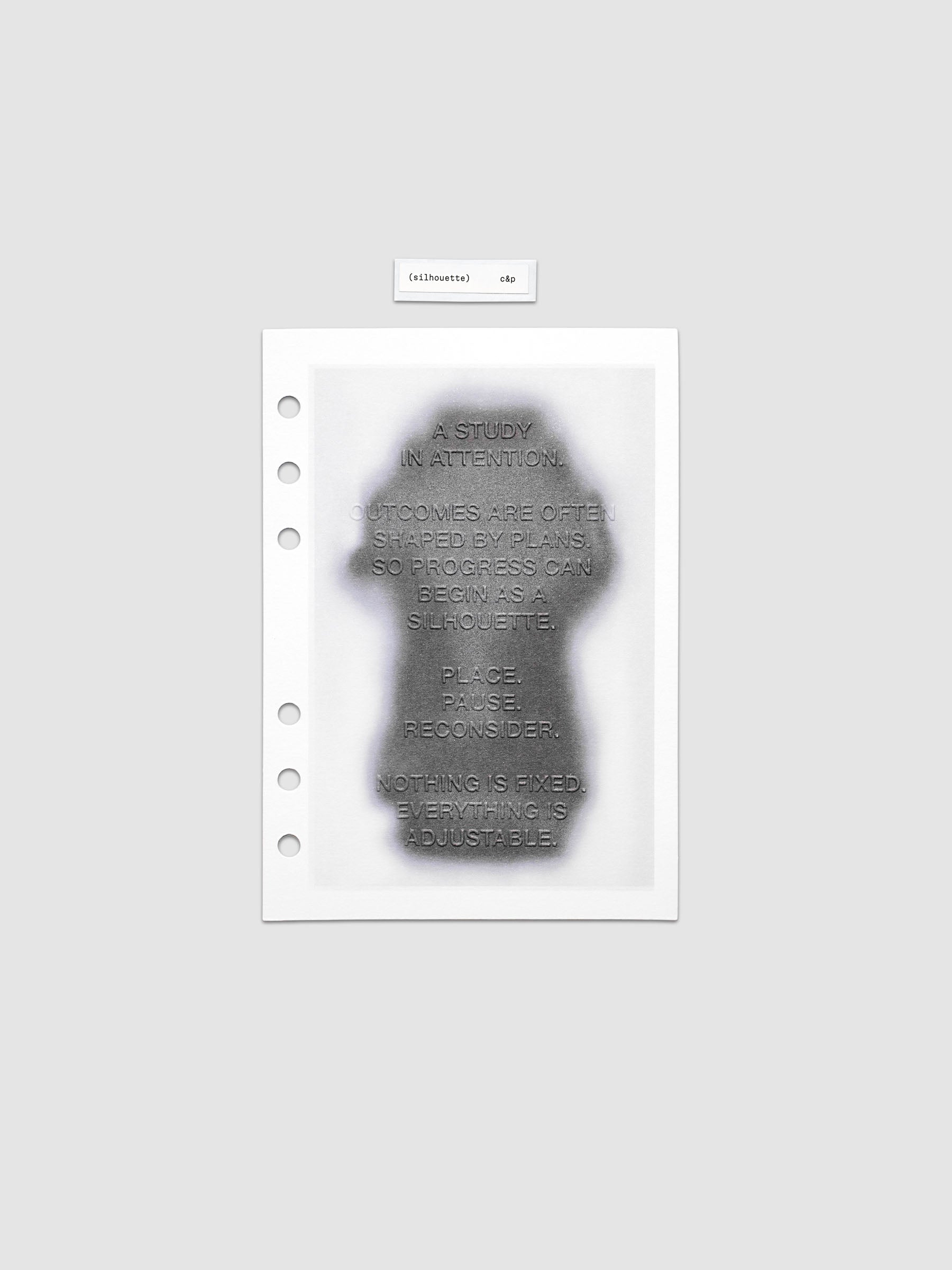 Silhouette Planner Dashboard in Personal Wide. Greyscale silhouette print with embossed text on paper. Image 1 of 2.