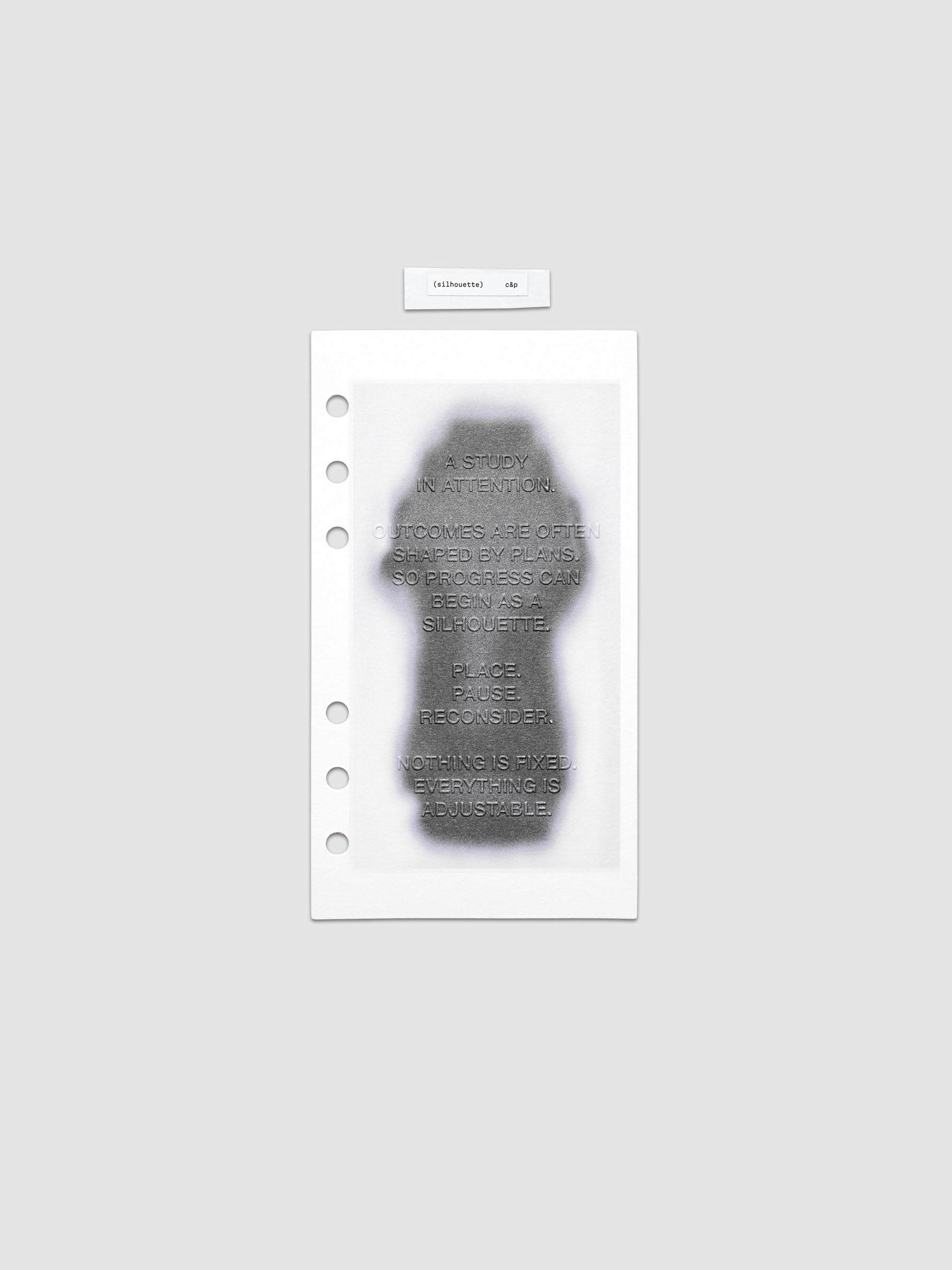 Silhouette Planner Dashboard in Personal. Greyscale silhouette print with embossed text on paper. Image 1 of 2.