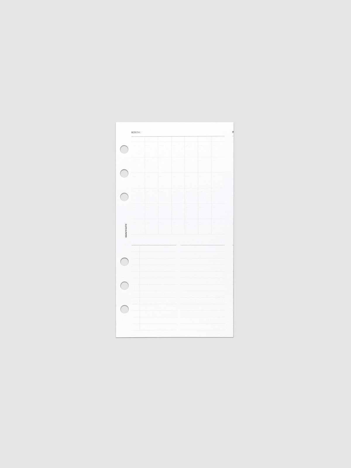 Monthly Fold Out Planner Insert Set of 2, Personal 6-Ring Punch, one narrow white insert folded closed and shot flat and straight on, six round punch holes down the left edge