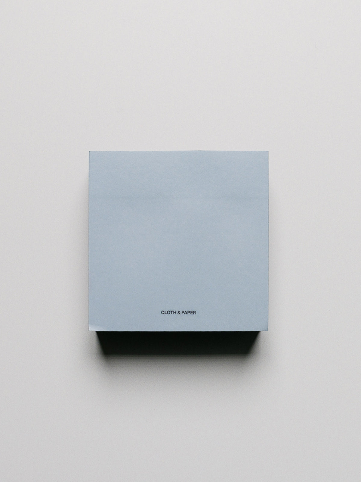 Block of blue/navy Colorblock sticky notes.