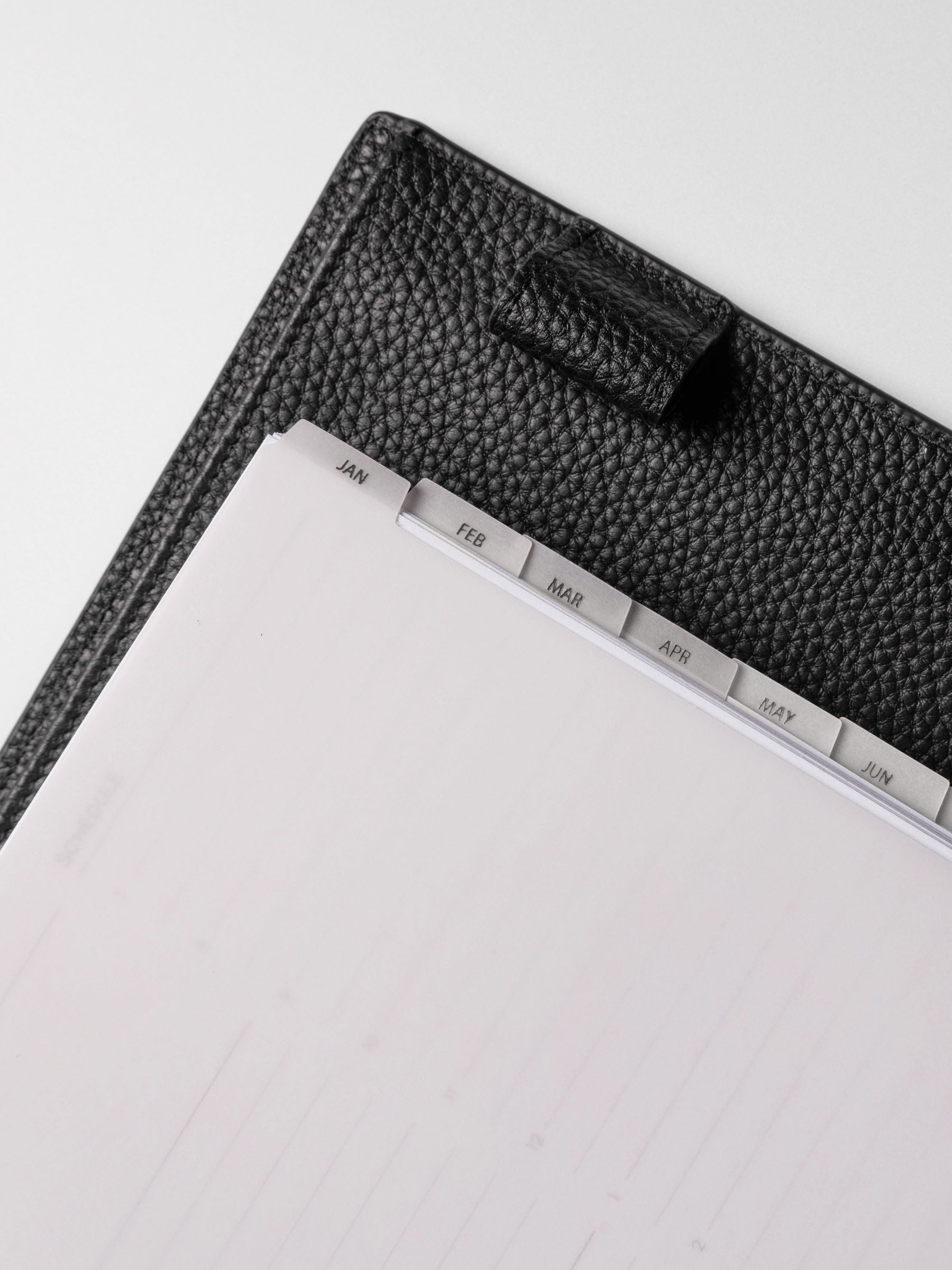 Close up view of the tabs on A5 vellum dividers.