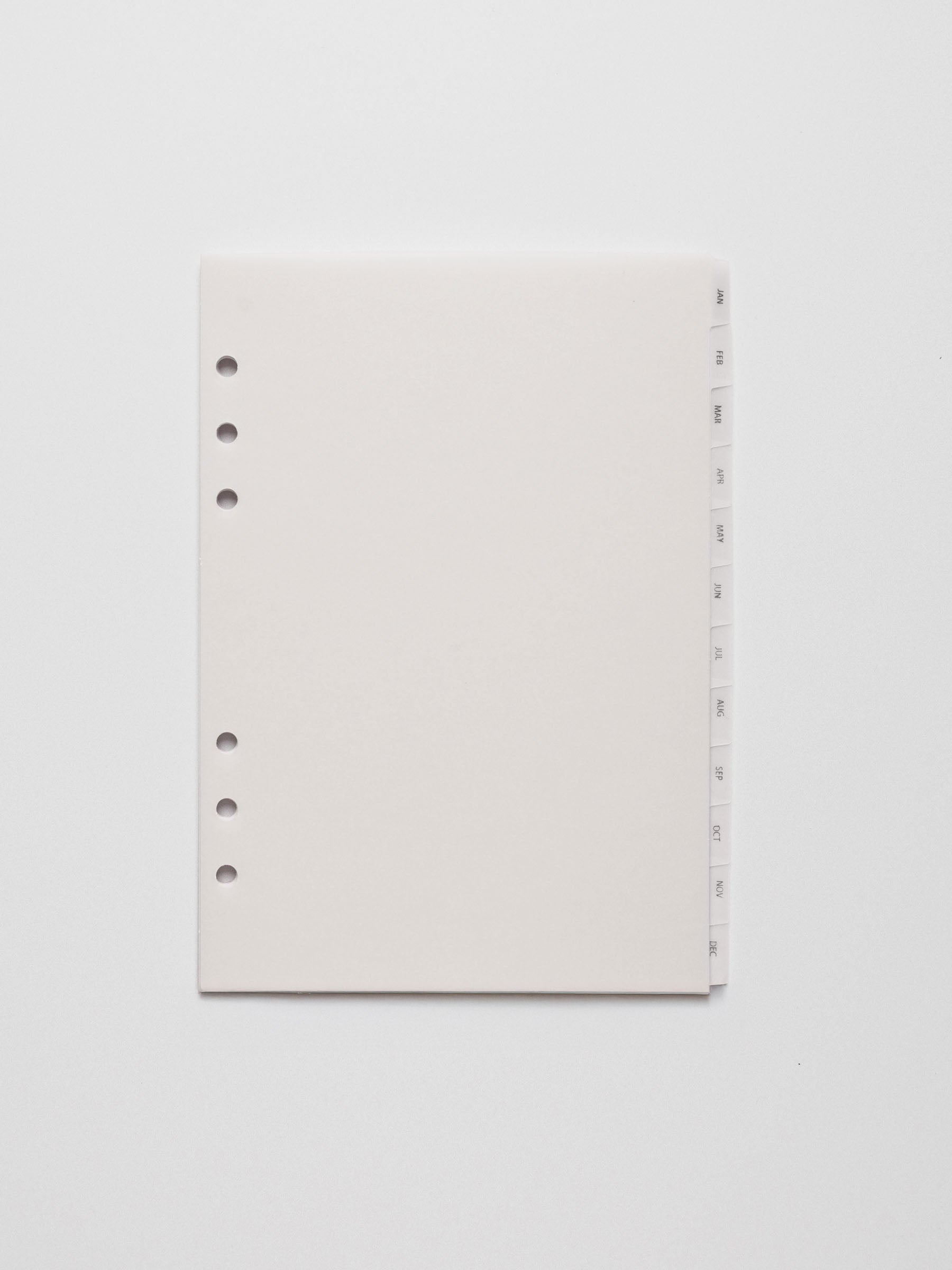 A5 vellum dividers shown on a grey background.