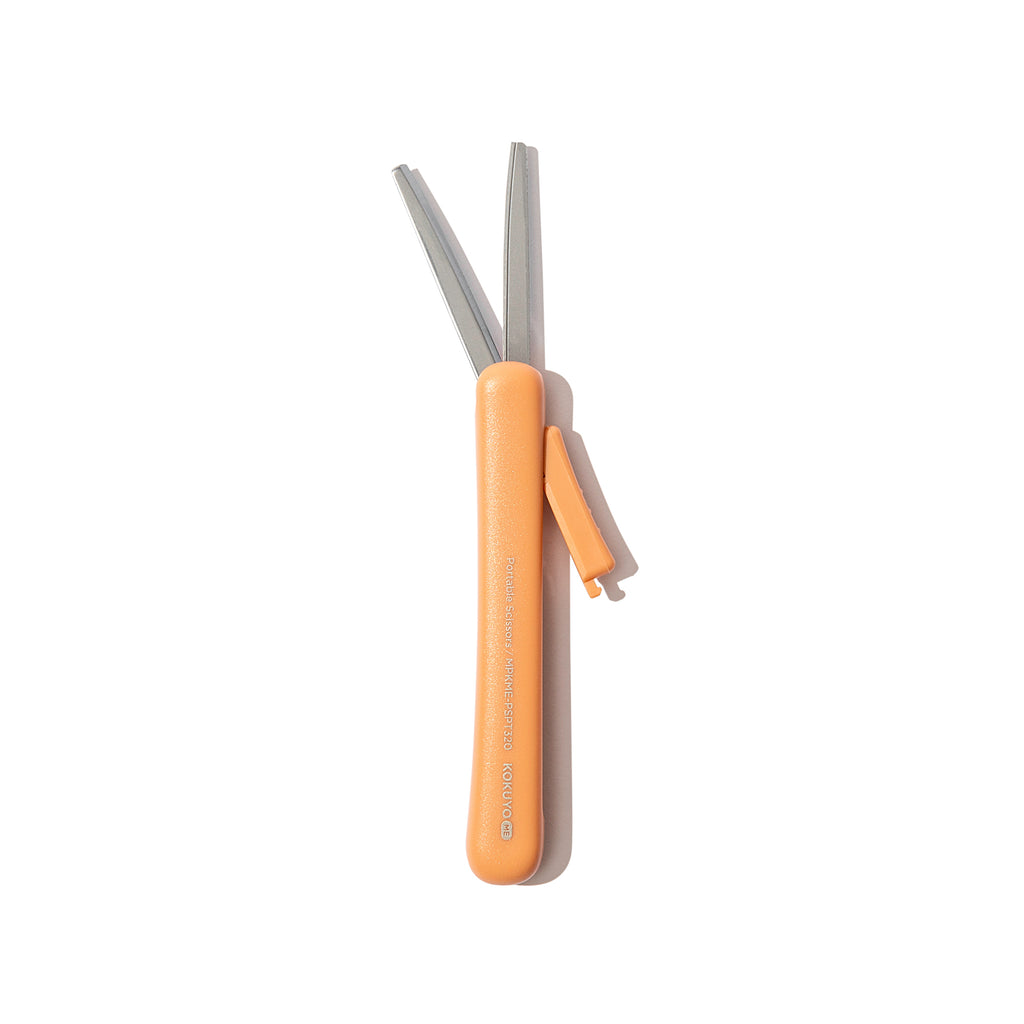 Scissors with blade exposed, displayed on a white background. Color shown is Kurumi Brown.
