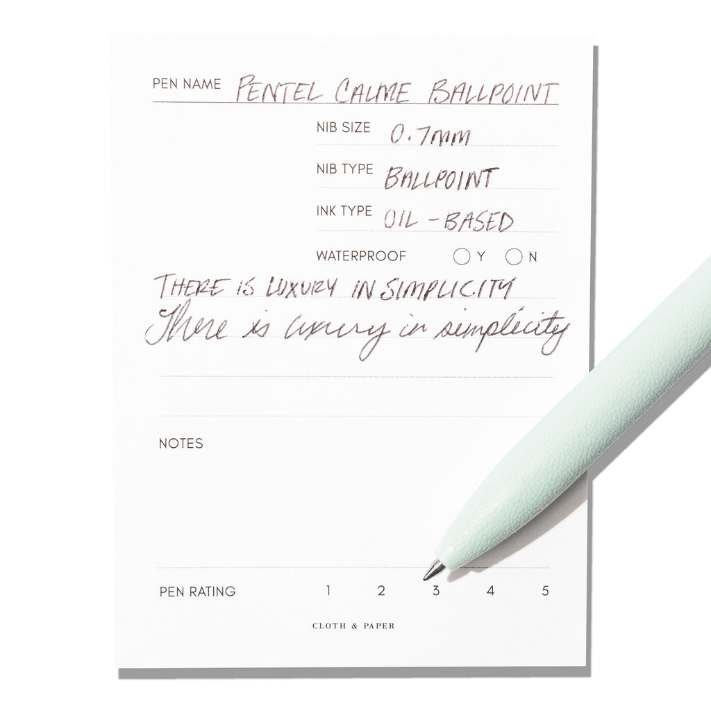 Pen displayed on an in use pen test sheet. The pen's barrel color is Sky Jade.