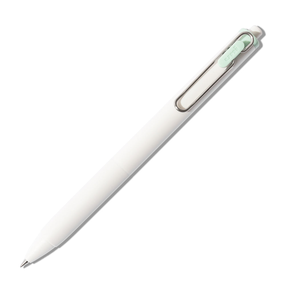 Jade green pen shown with nib exposed on a white background.