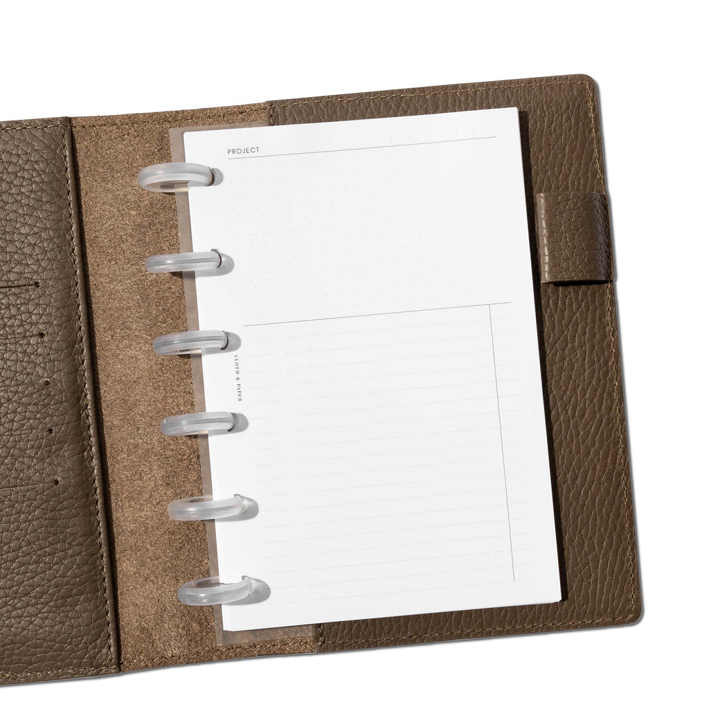 Insert in use inside a brown leather folio. Size pictured is CP Petite. 
