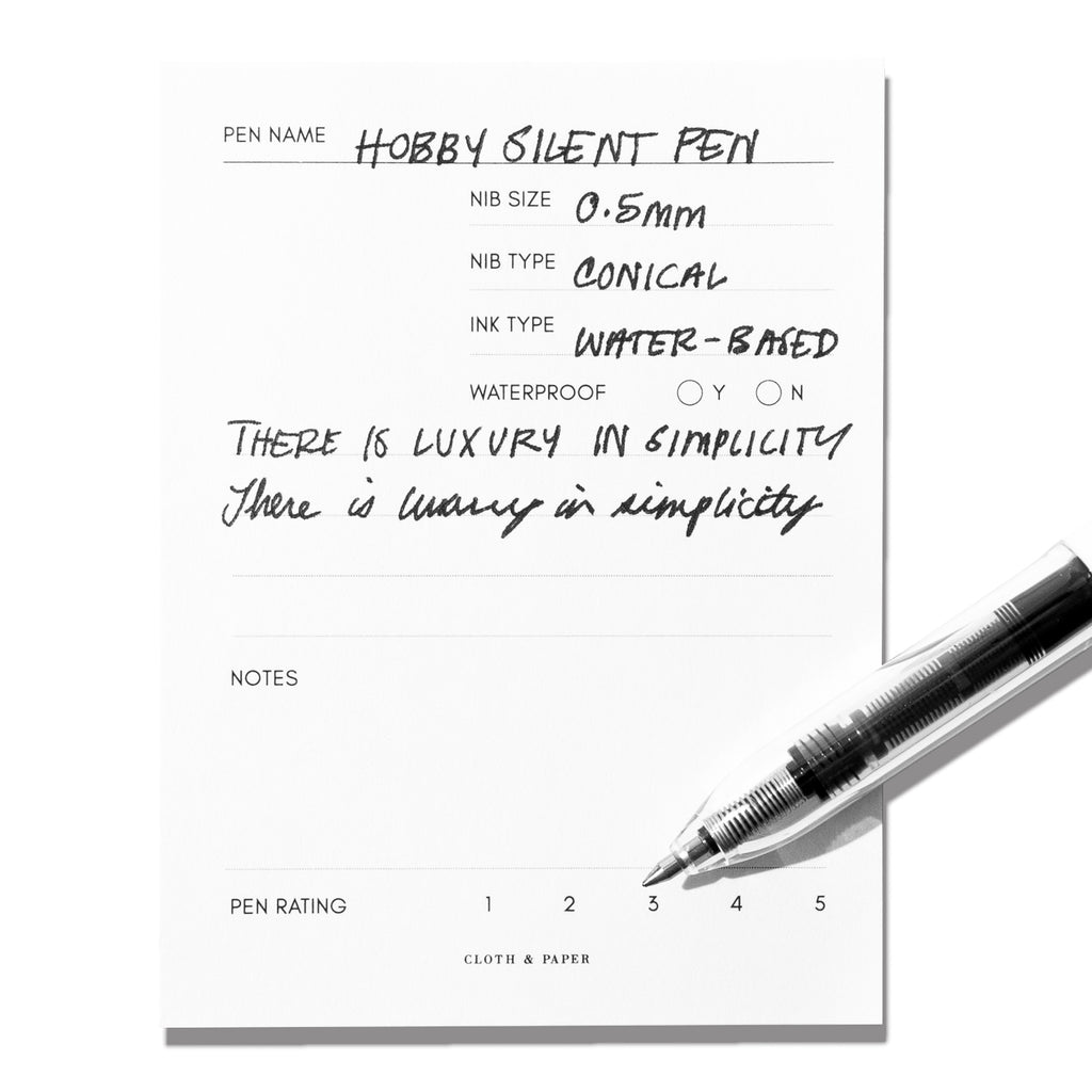 Hobby Silent Pen displayed on an in use pen testing sheet. Color shown is black.