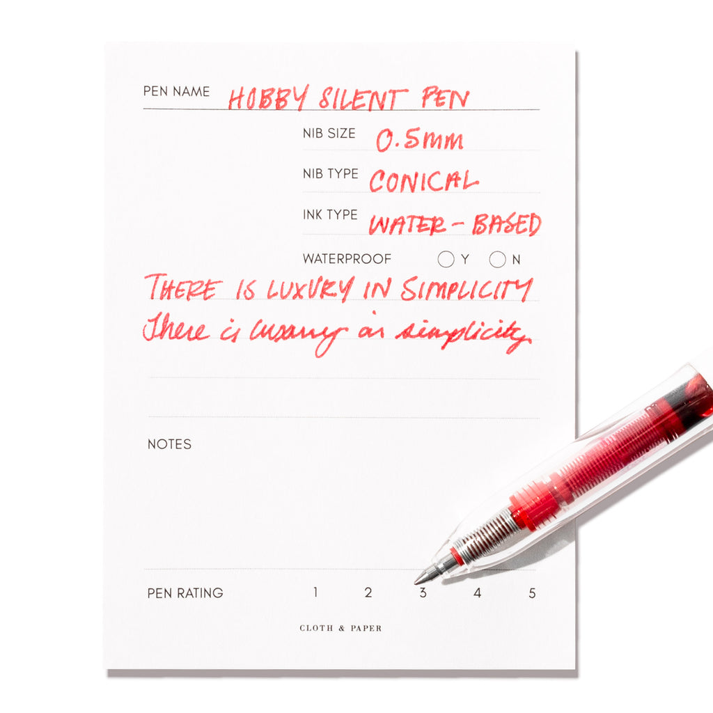 Hobby Silent Pen displayed on an in use pen testing sheet. Color shown is red.