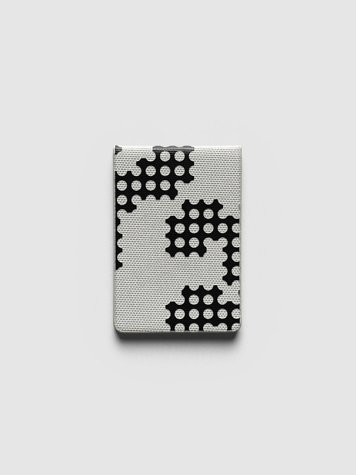 Magnetic Bookmarks Punched Holes & Margin, Punched Holes bookmark folded, black blocks of holes printed on grey bookcloth
