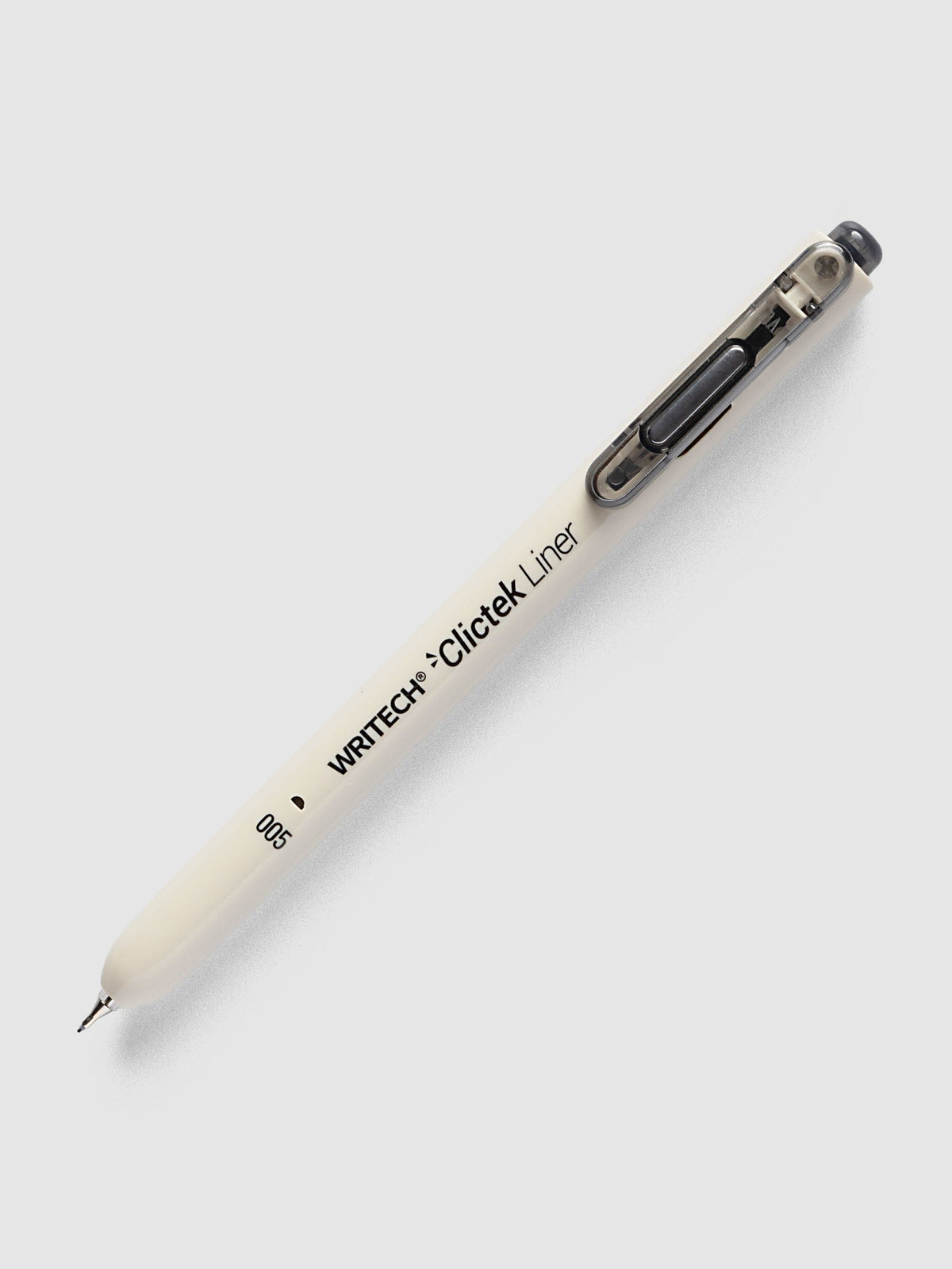 Writech Clictek Liner Pen, 0.05 mm, beige barrel with a smoke grey clicker and clip, lying at an angle