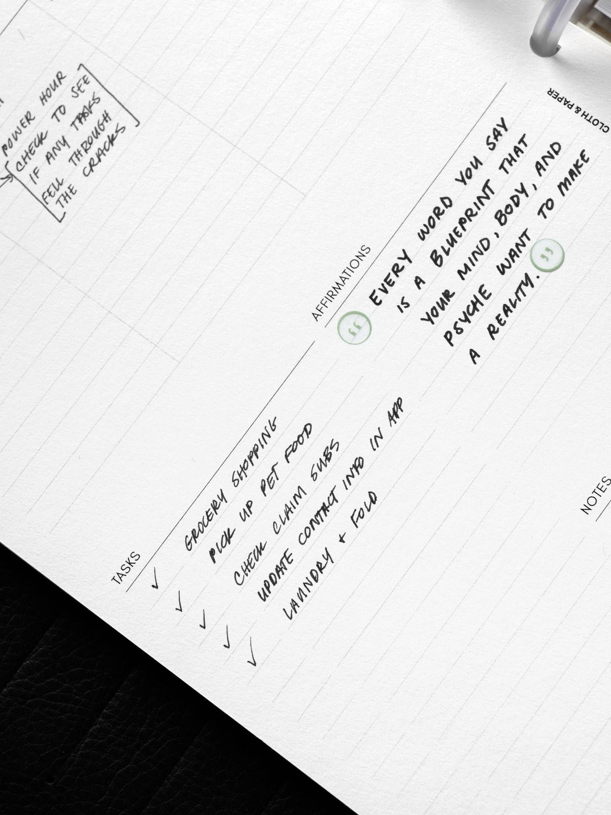 Weekly Essentials Planner Inserts, Half Letter 8-Disc Punch, close-up of a handwritten task list and affirmation