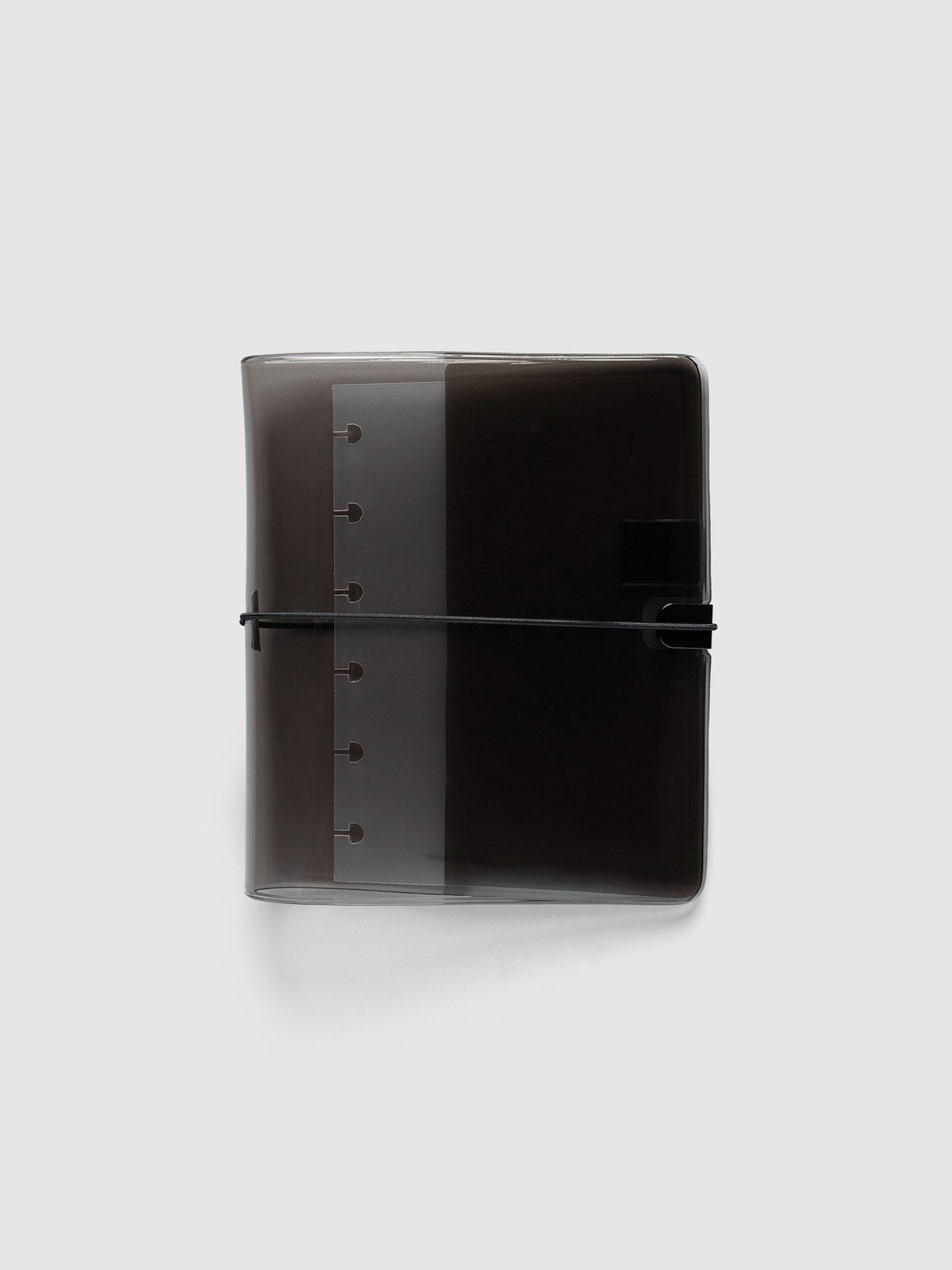 Folio Cover in black tinted vinyl, CP Petite (CP Petite 6-Disc Punch), closed with a black bungee cord hooked to a black clip