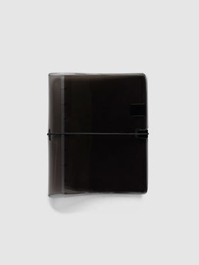 Folio Cover in black tinted vinyl, Small (HP Mini 7-Disc Punch), closed with a black bungee cord hooked to a black clip