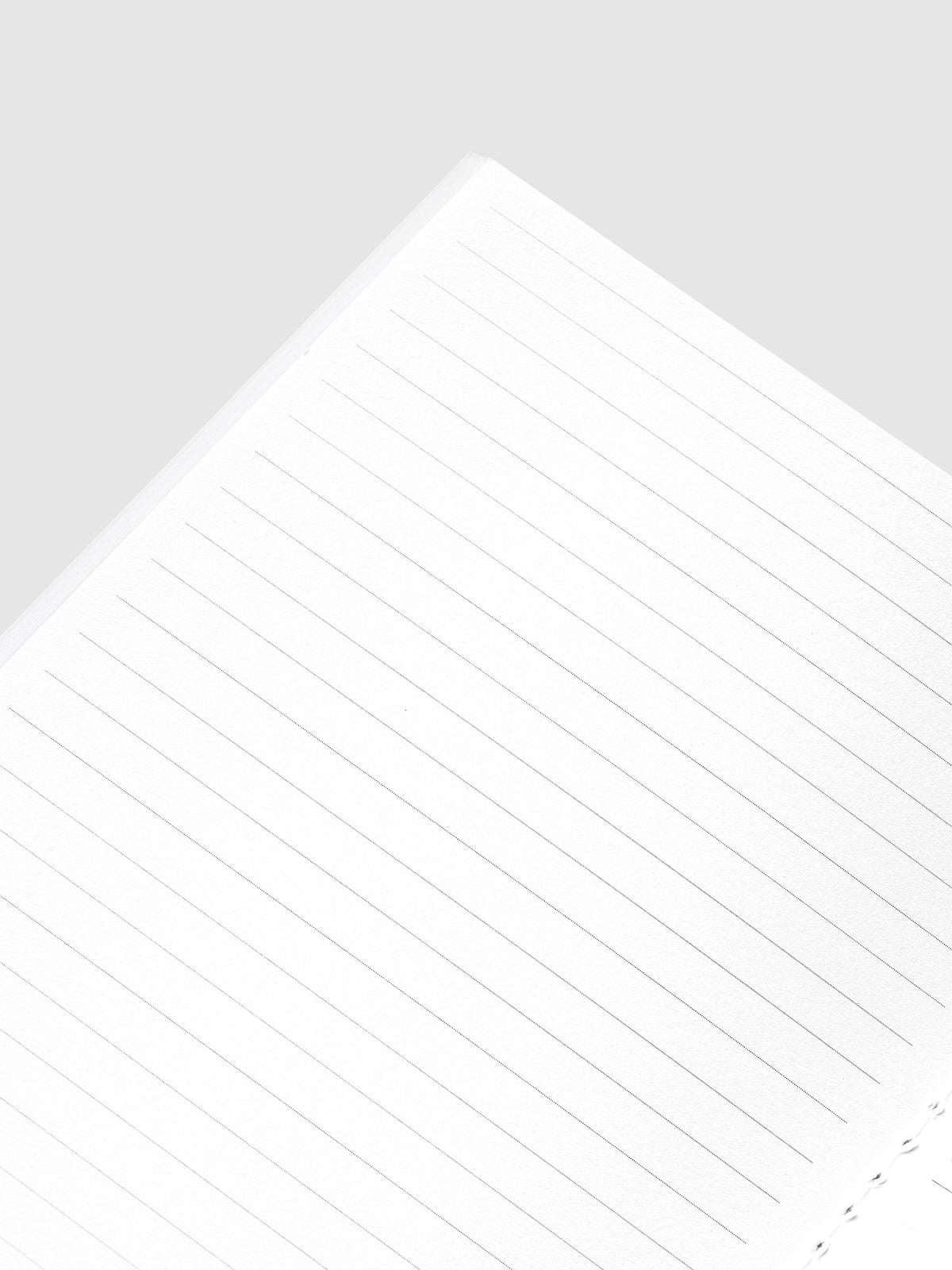 Angled close-up of the lined page opposite the monthly overview in the Monthly Overview A5 Slim