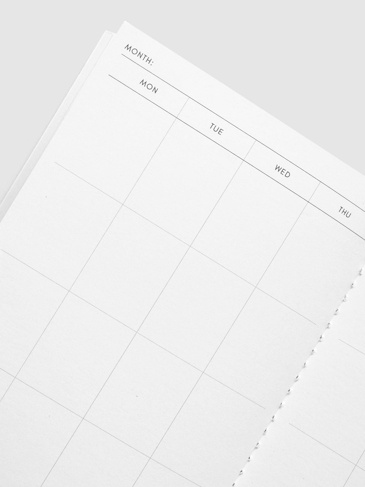 Close-up of the Month line and Monday to Thursday columns of the calendar spread in the Monthly Overview A5 Slim