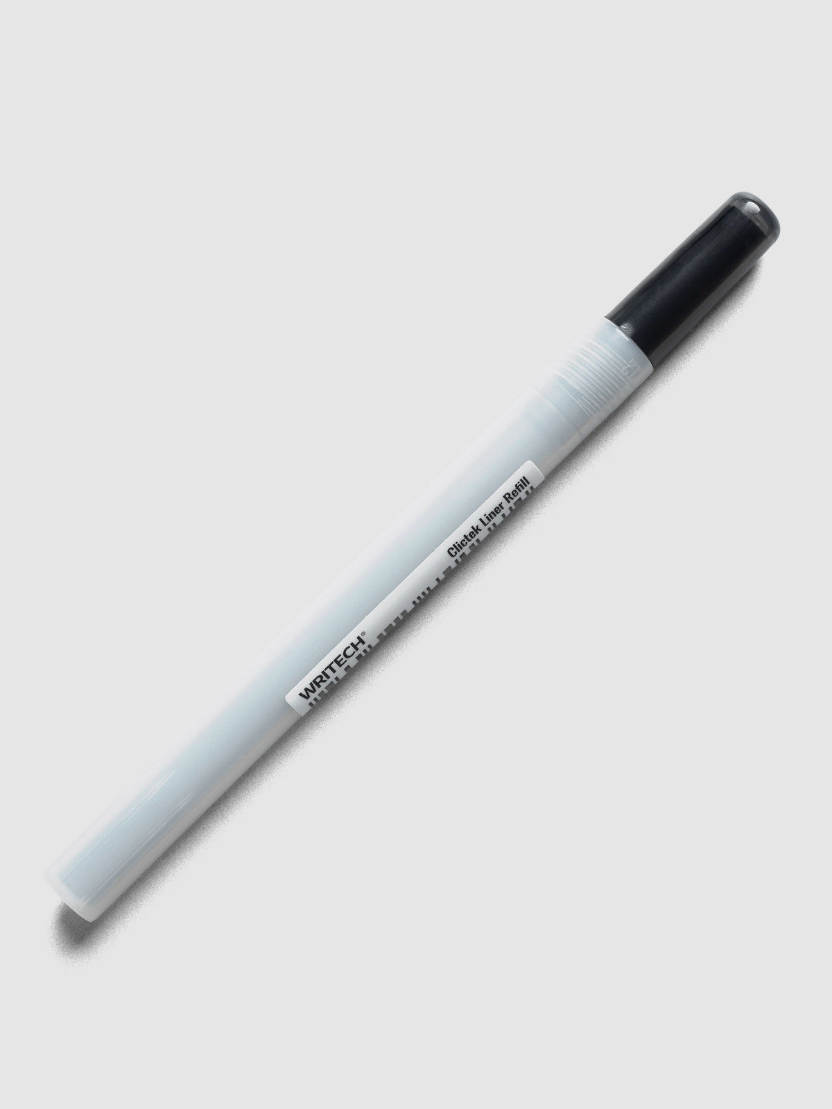 Writech Clictek Liner Refill, a frosted white plastic tube with a black cap and a white Writech label, on a light grey background