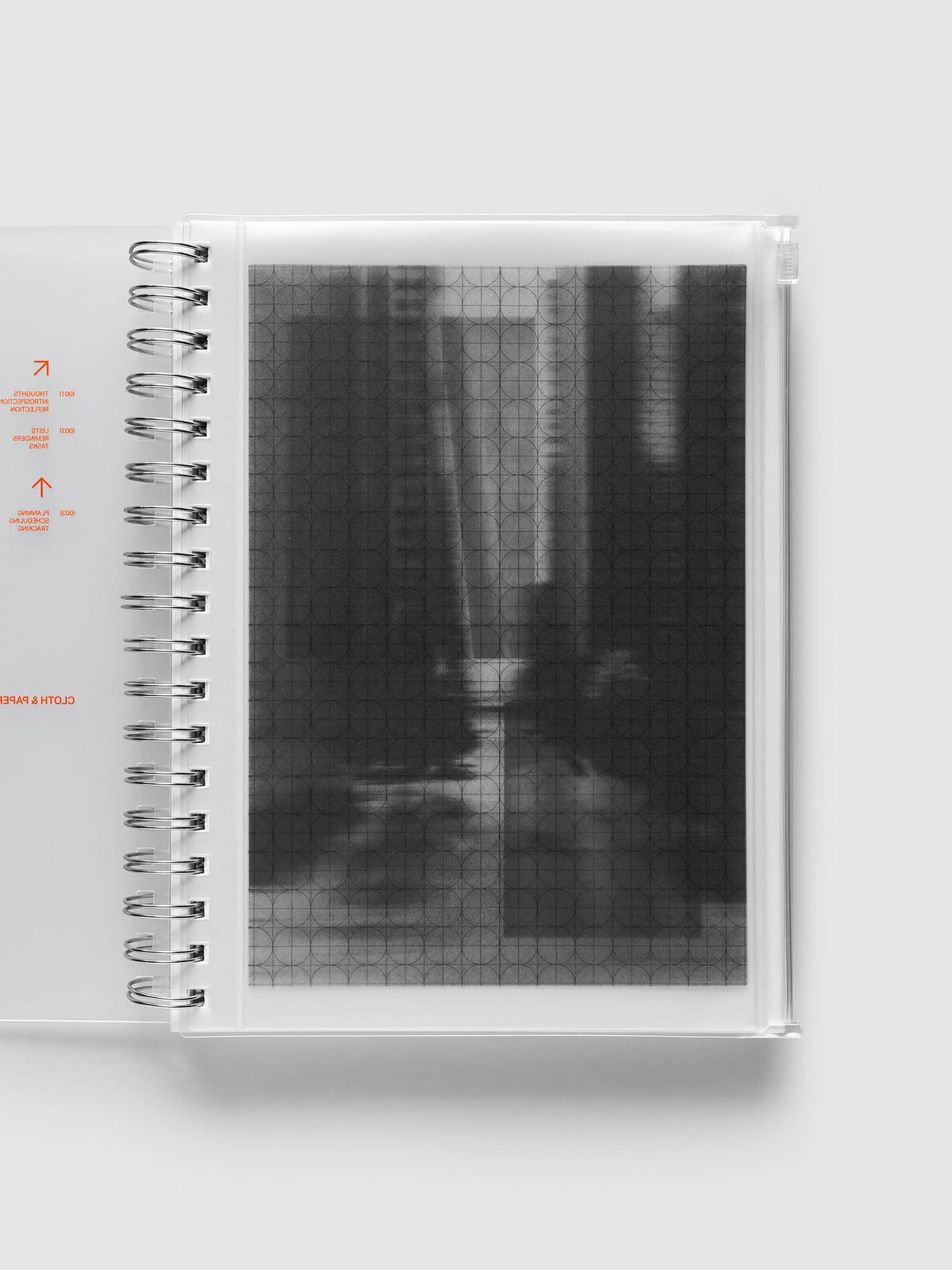 Graph Storage Holder bound into a spiral notebook in size HP Classic Spiral, with the graph overlay and photo insert visible through the frosted pouch.