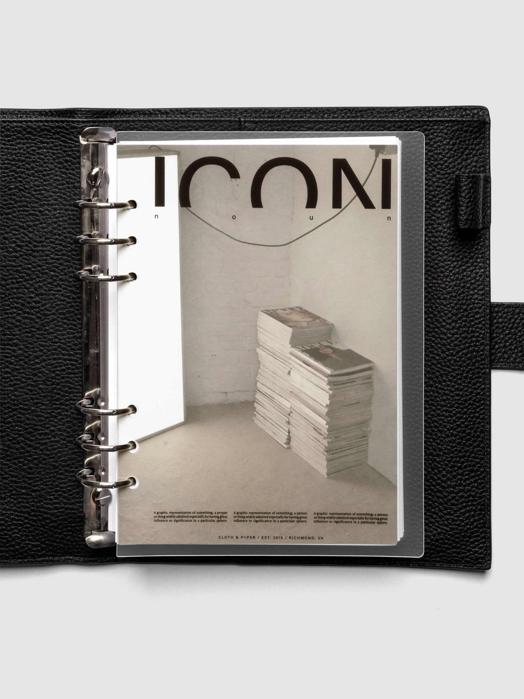 Clear planner cover with black text and a photographic dashboard shown pre-punched for 6-ring planners in size A5 in a black agenda.