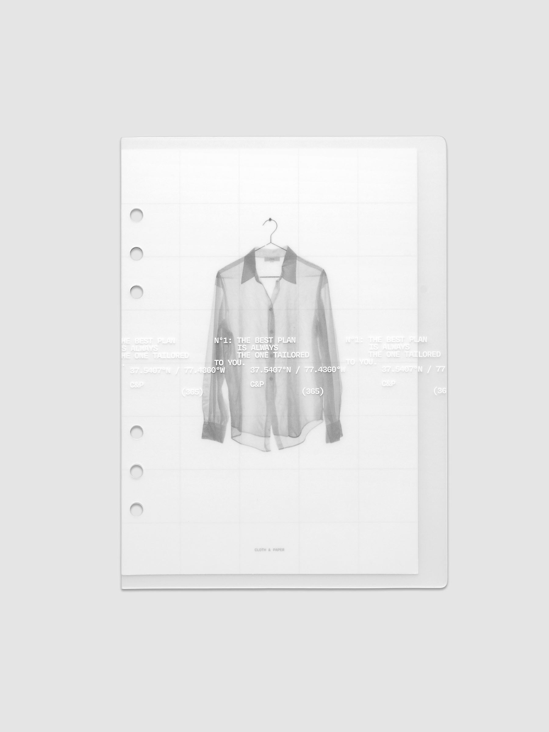 Transparent planner cover set with white printed text design and accompanying black and white dashboard with an image of a tailored shirt on a hanger. Pre-punched for 6-ring planners shown in size A5.