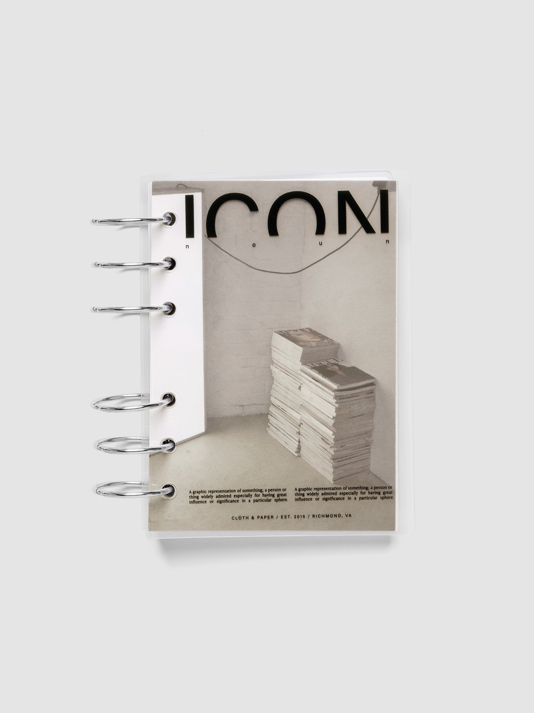 Clear planner cover with black text and a photographic dashboard shown pre-punched for 6-ring planners in size A6.