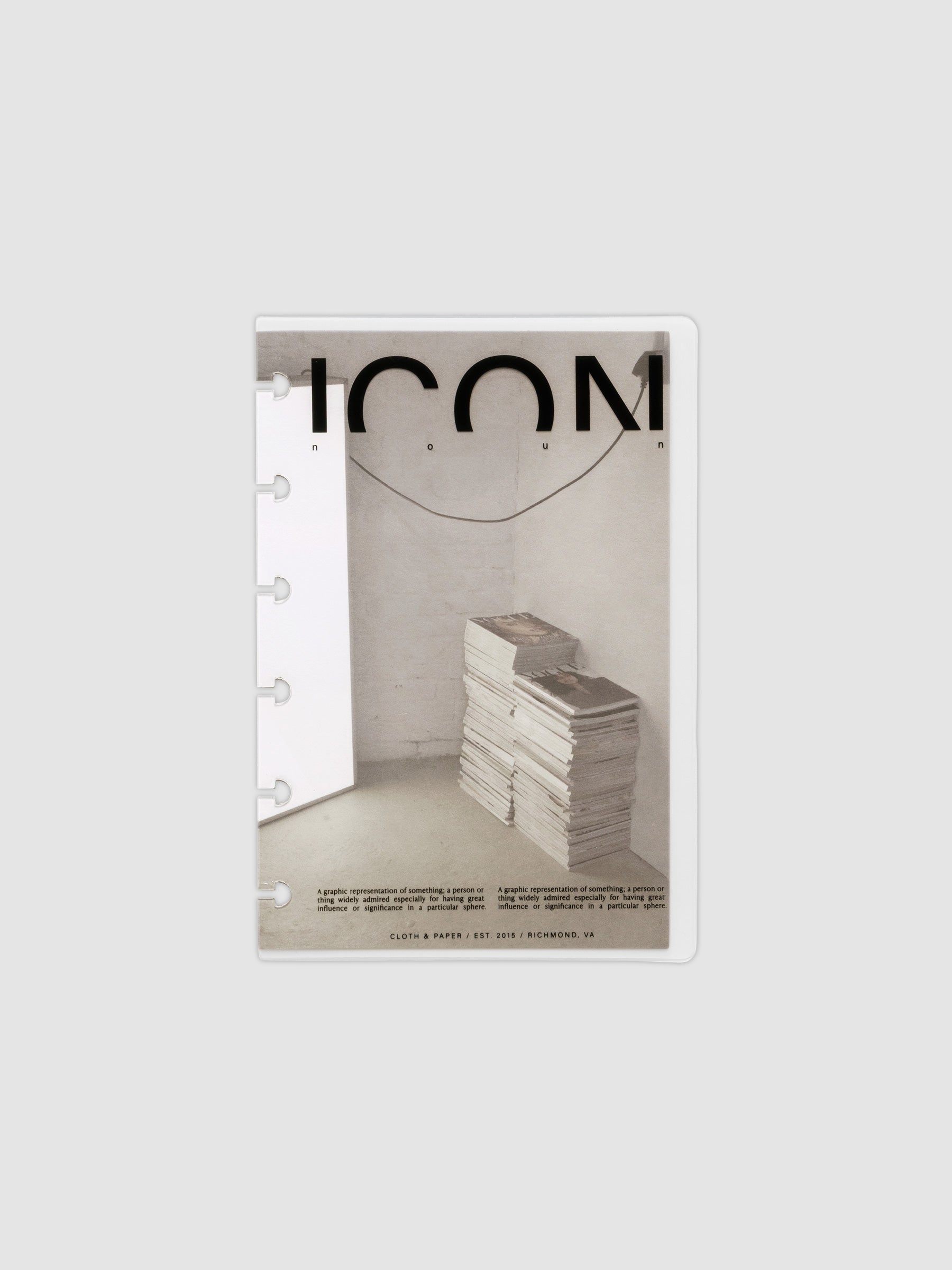 Clear planner cover with black text and a photographic dashboard shown pre-punched for discbound planners in size CP Petite.