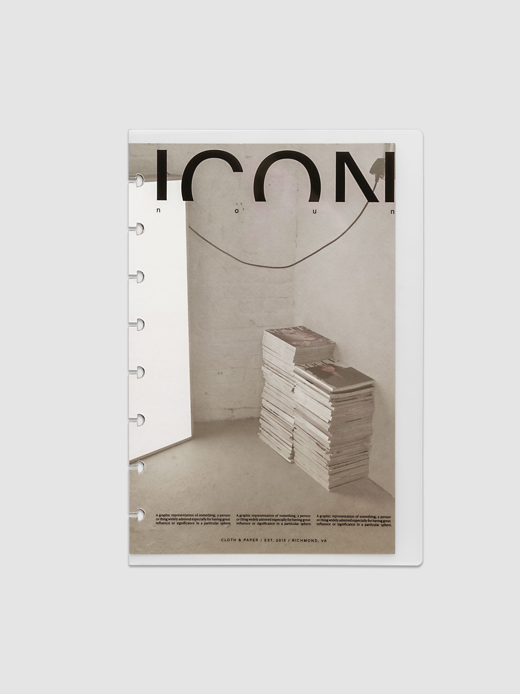 Clear planner cover with black text and a photographic dashboard shown pre-punched for discbound planners in size Half Letter.