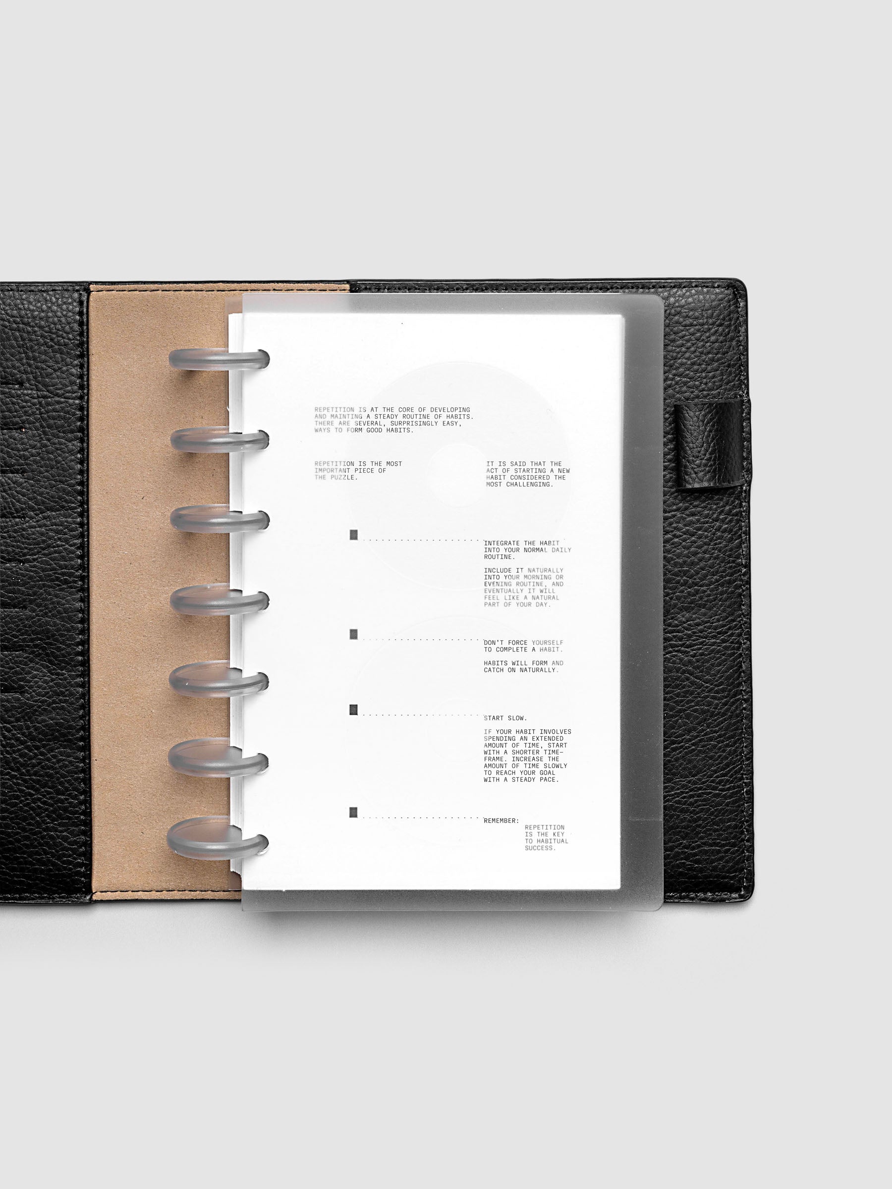 On Repeat Planner Cover + Dashboard Set  shown in a black, HP Mini folio.