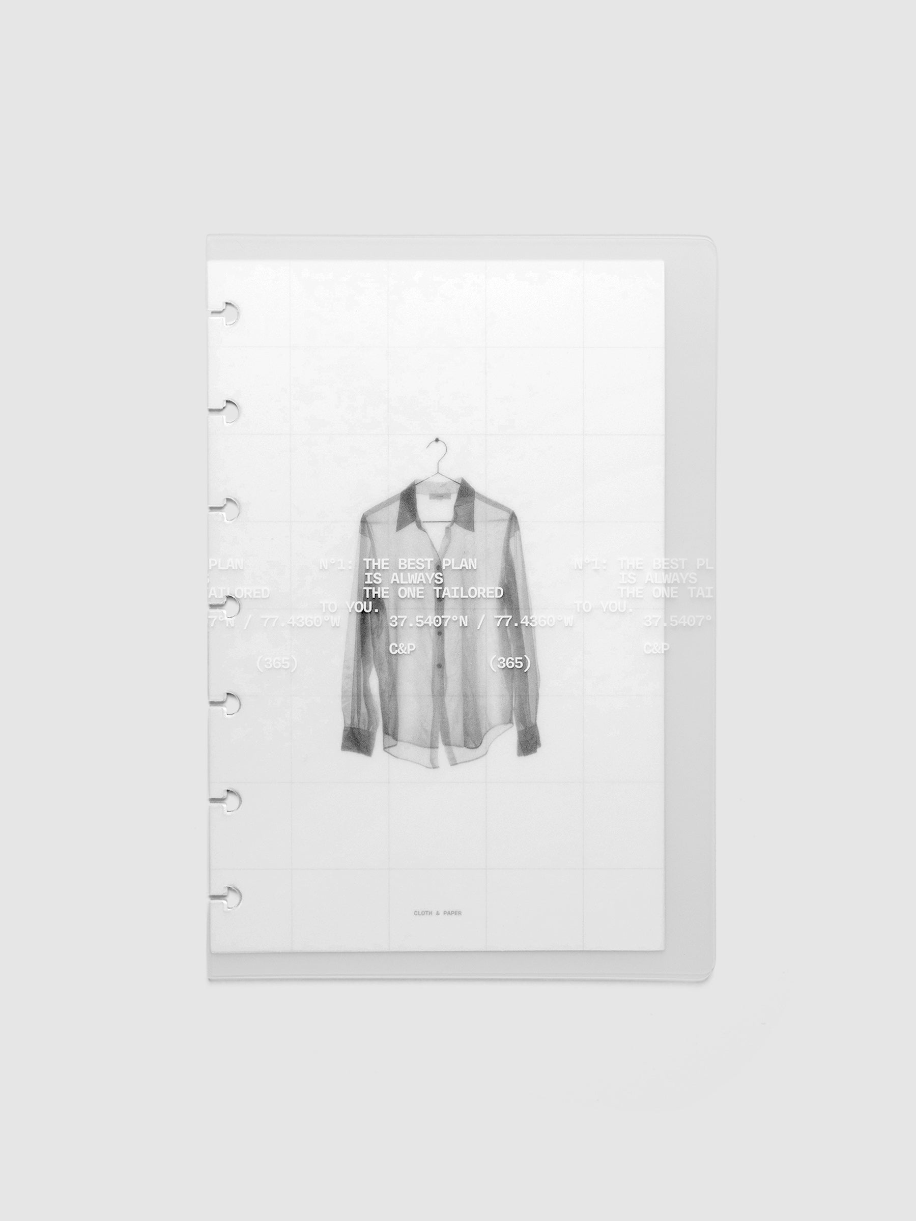 Transparent planner cover set with white printed text design and accompanying black and white dashboard with an image of a tailored shirt on a hanger. Pre-punched for 7-disc planners shown in size HP Mini.
