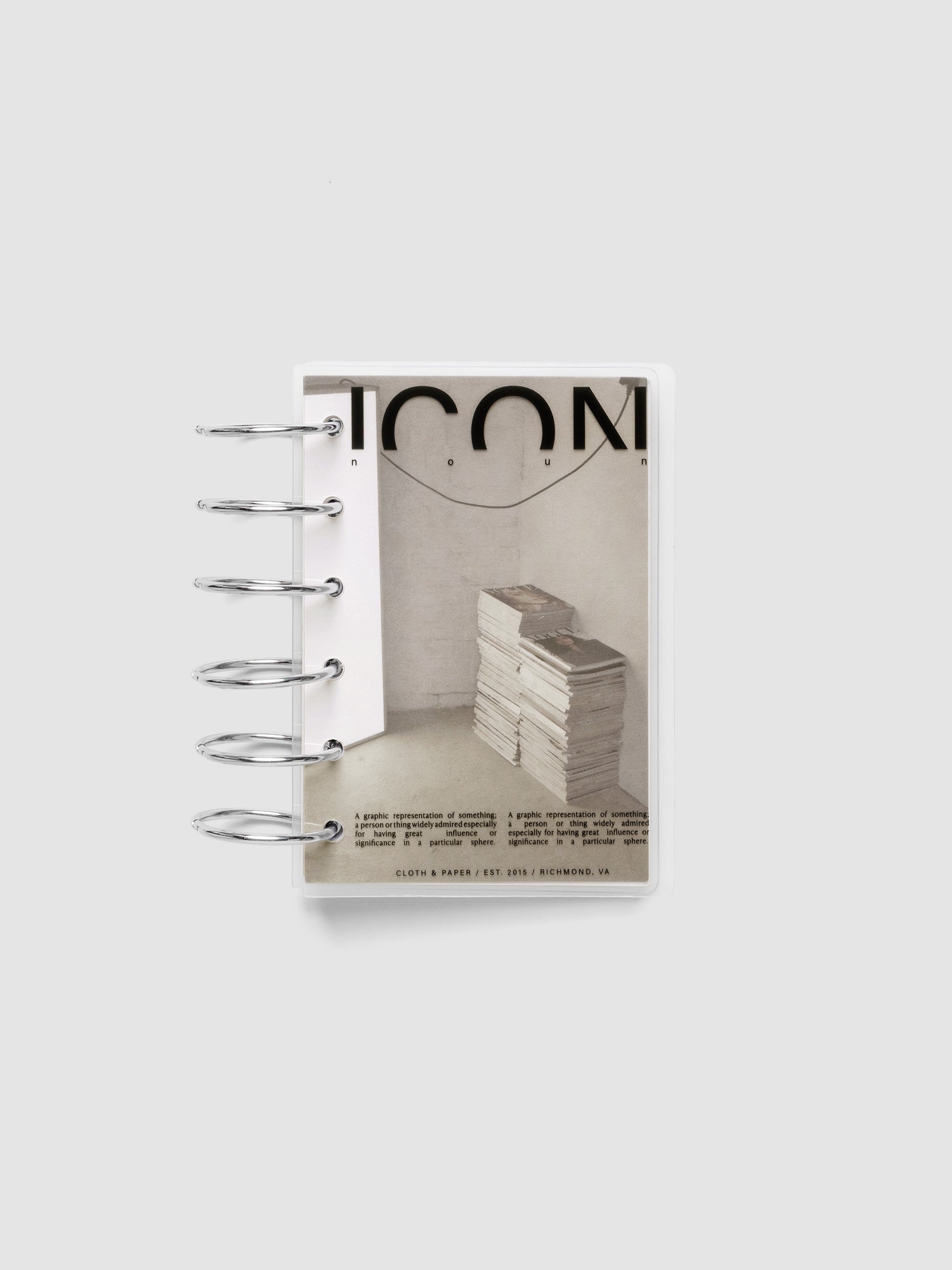 Clear planner cover with black text and a photographic dashboard shown pre-punched for 6-ring planners in size Pocket.