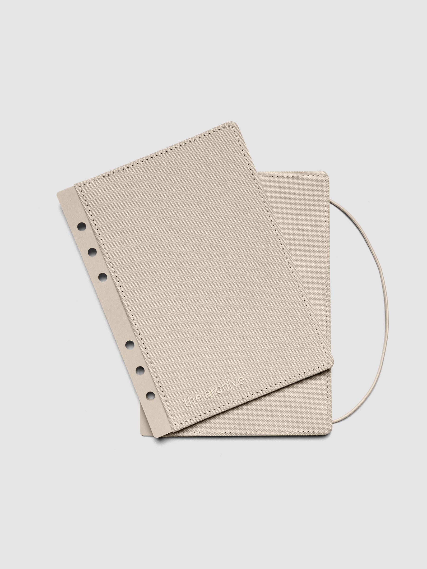 Beige Archive Bookcloth Planner Cover Set showing layers offset in size Personal Wide.