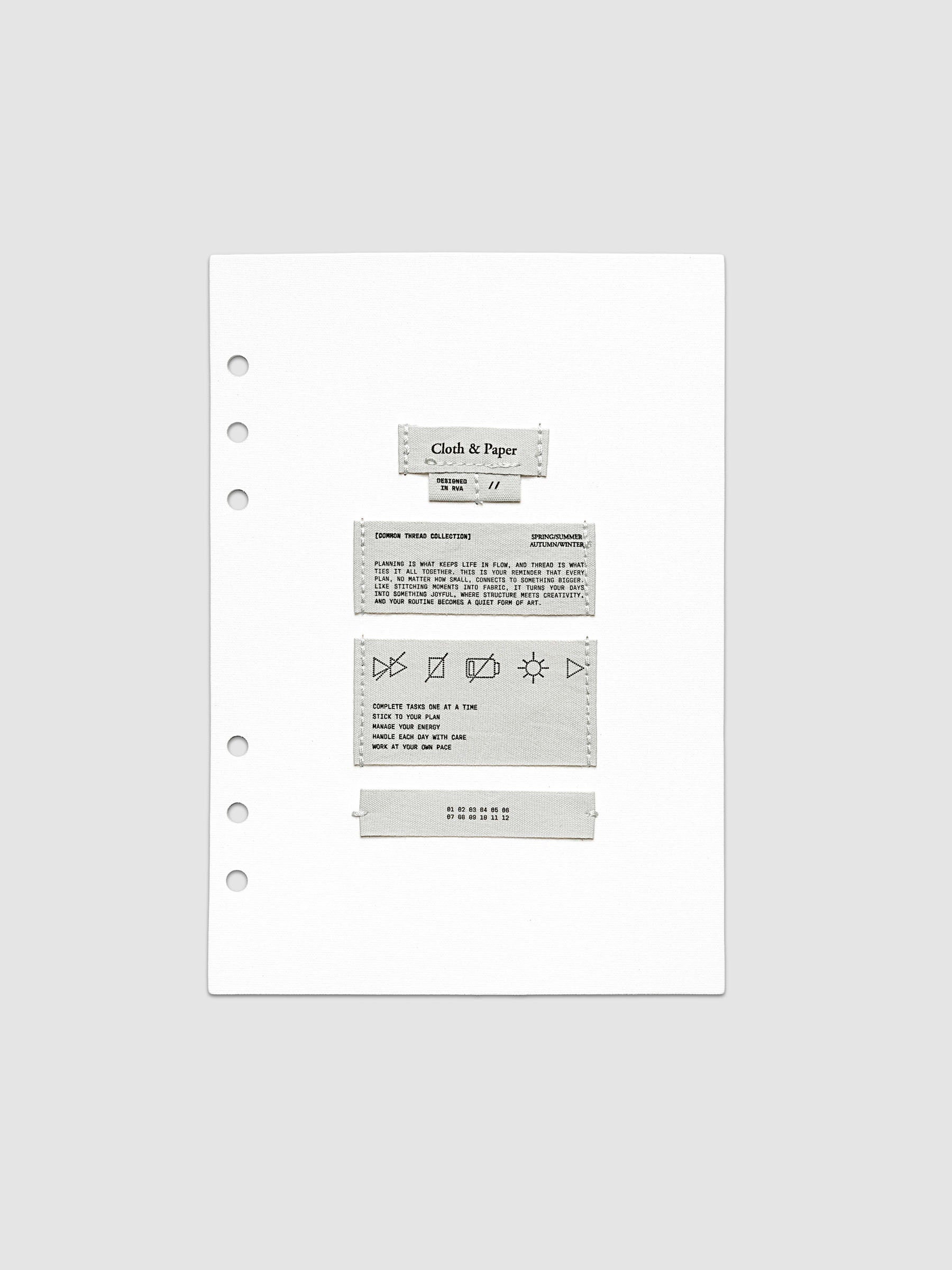 Sewn Tags Planner Dashboard shown pre-punched for 6-ring planners in size A5.