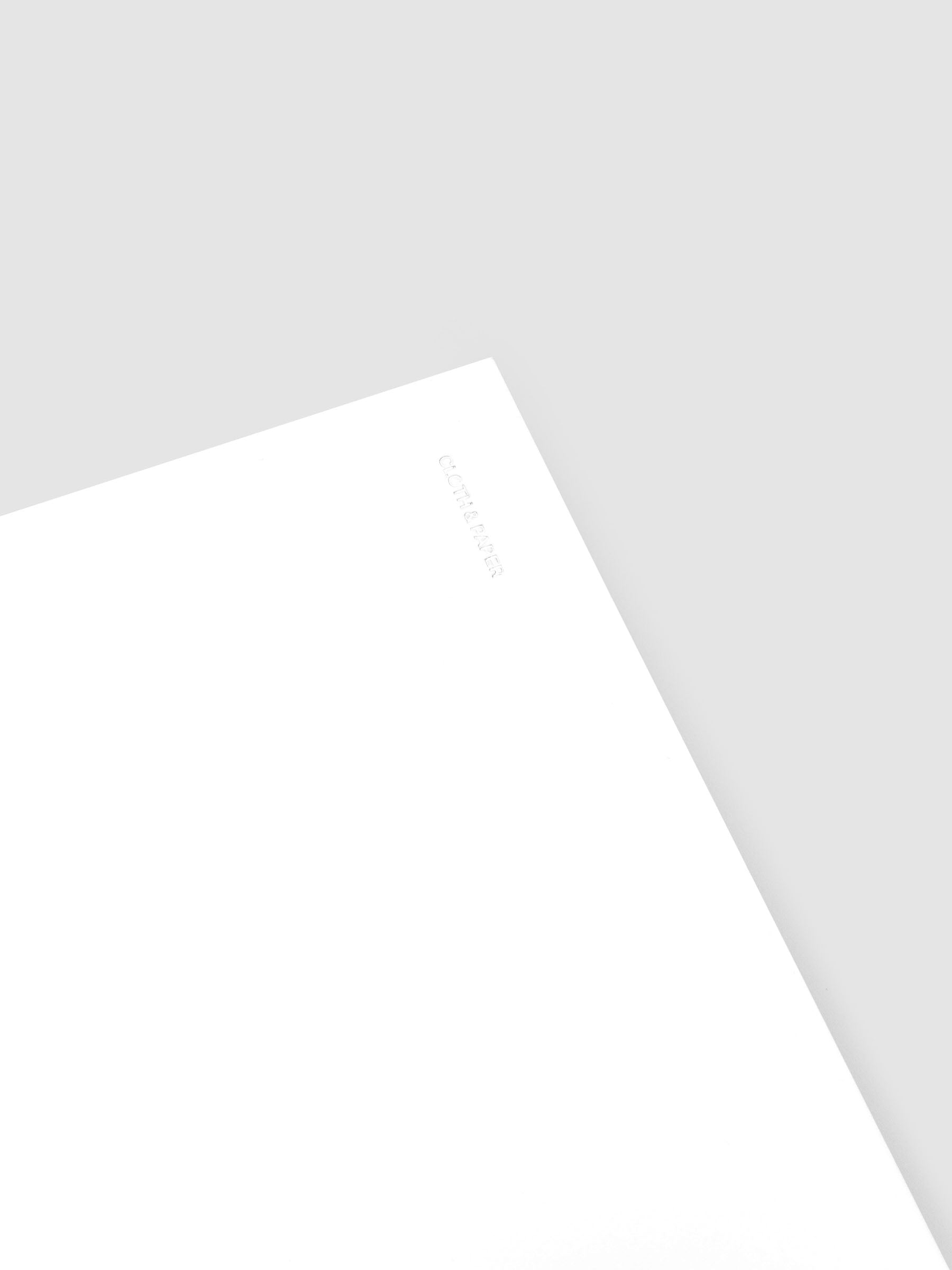 Detail view of the Spiral Notebook dashboard in the color Le Blanc shown in size A5 against a neutral background.