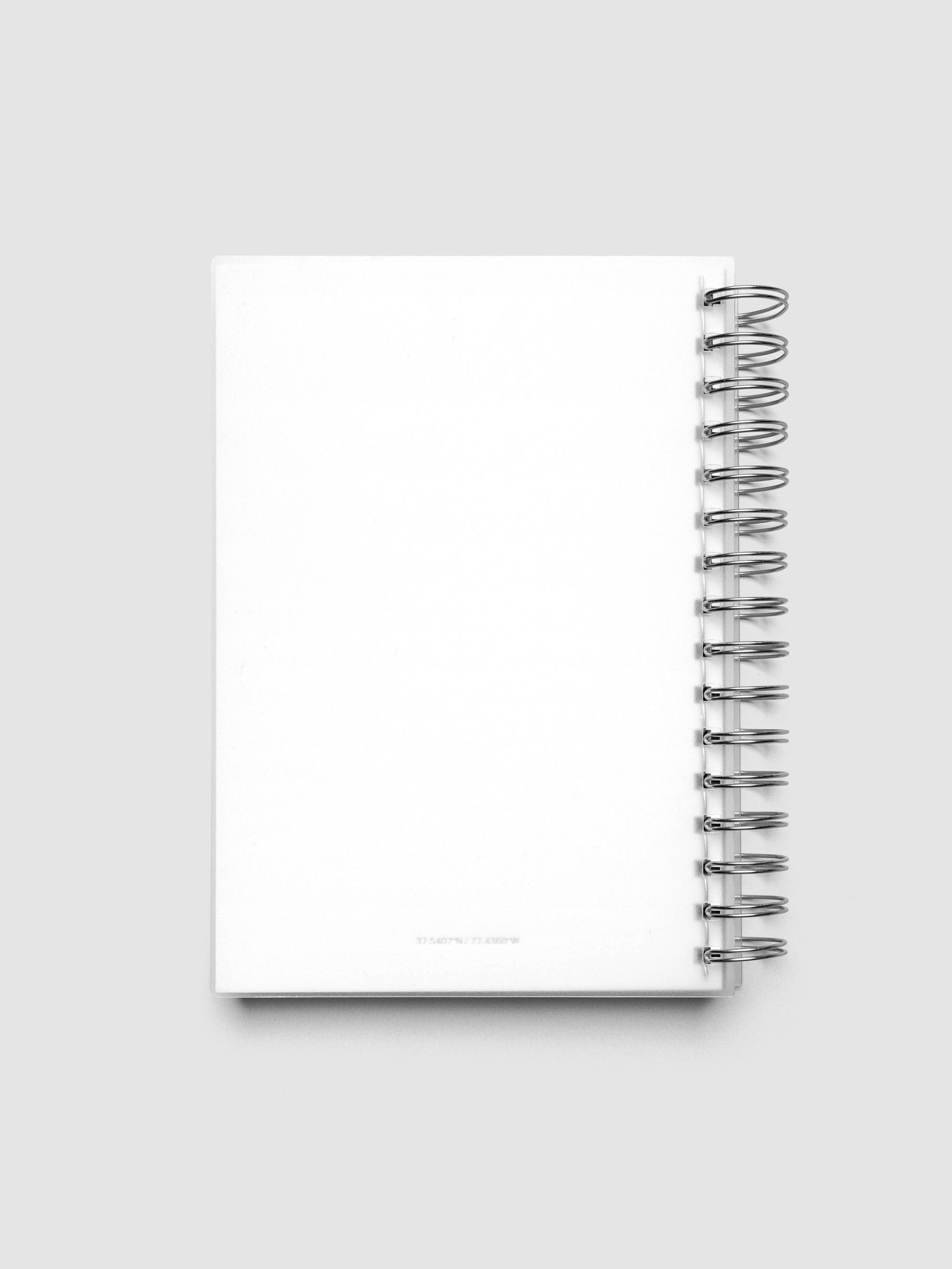 Spiral Notebook dashboard in the color Le Blanc shown in size A5 inside a notebook with the frosted transparent cover overlayed.