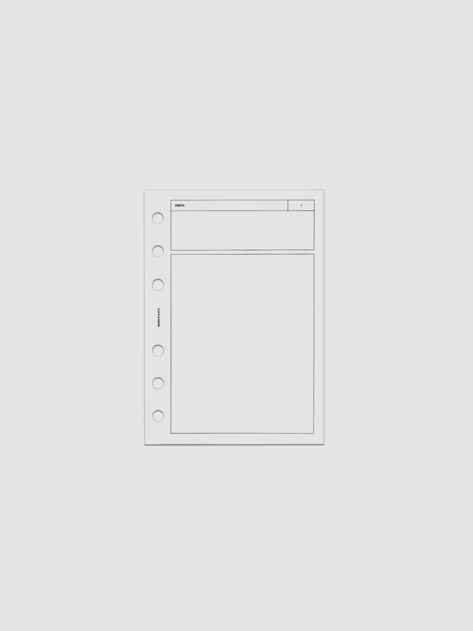 Clear, flexible plastic dashboard with black printed rectangular boxes and a header titled 'Inbox'. Shown in size A6, pre-punched for 6-ring binders.