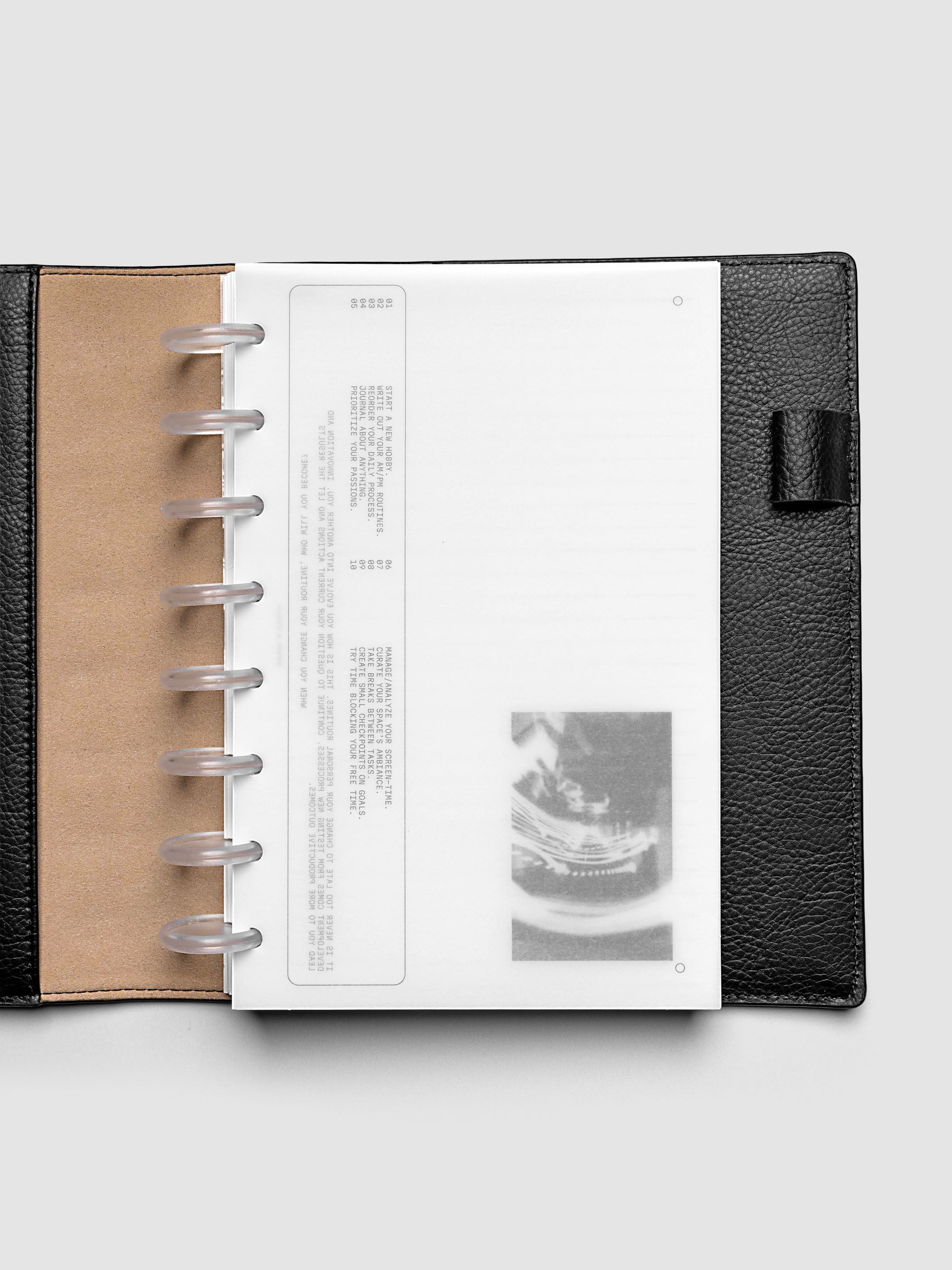 Side A & Side B Planner Dashboard in size Half Letter shown in a black folio.