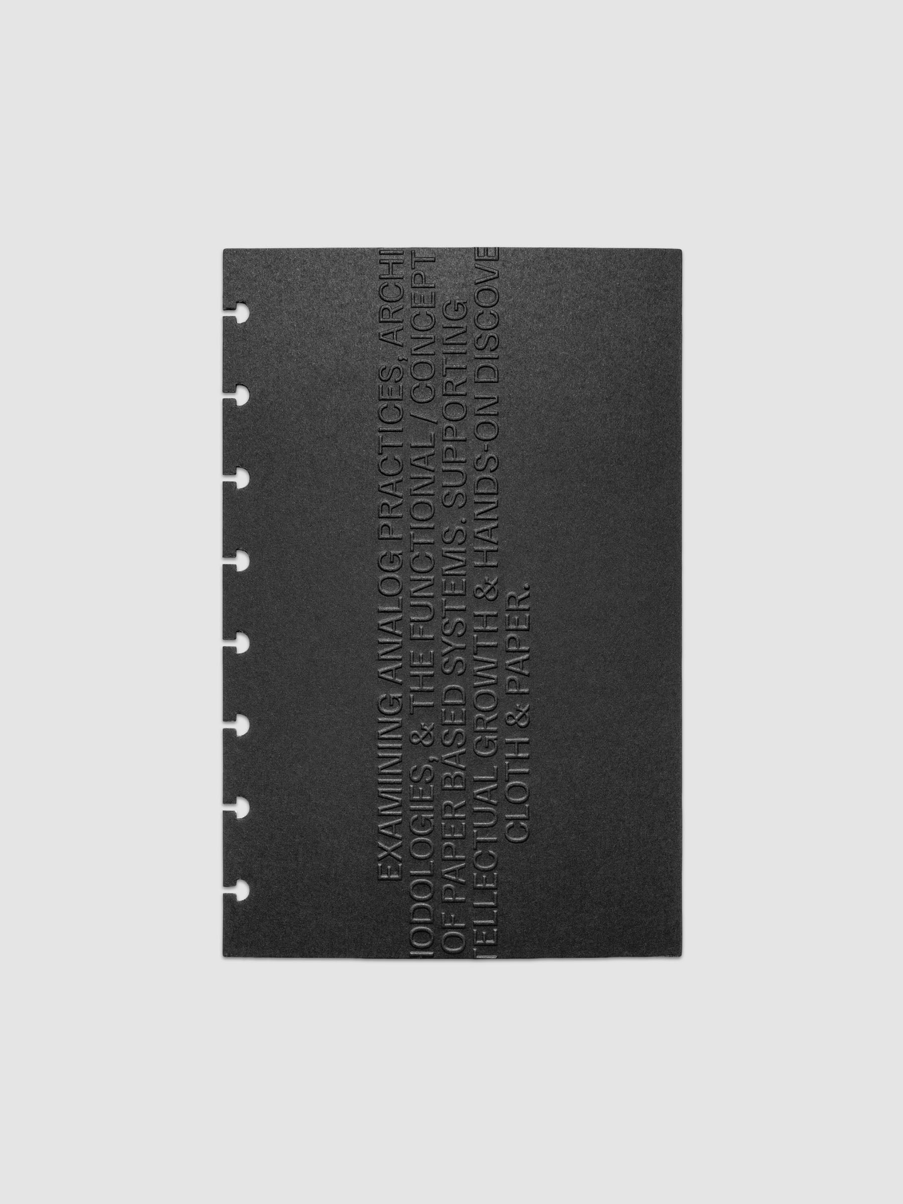 Black embossed Analog Embossed Planner Dashboard without the drop card shown in size Half Letter 8-Disc Punch.