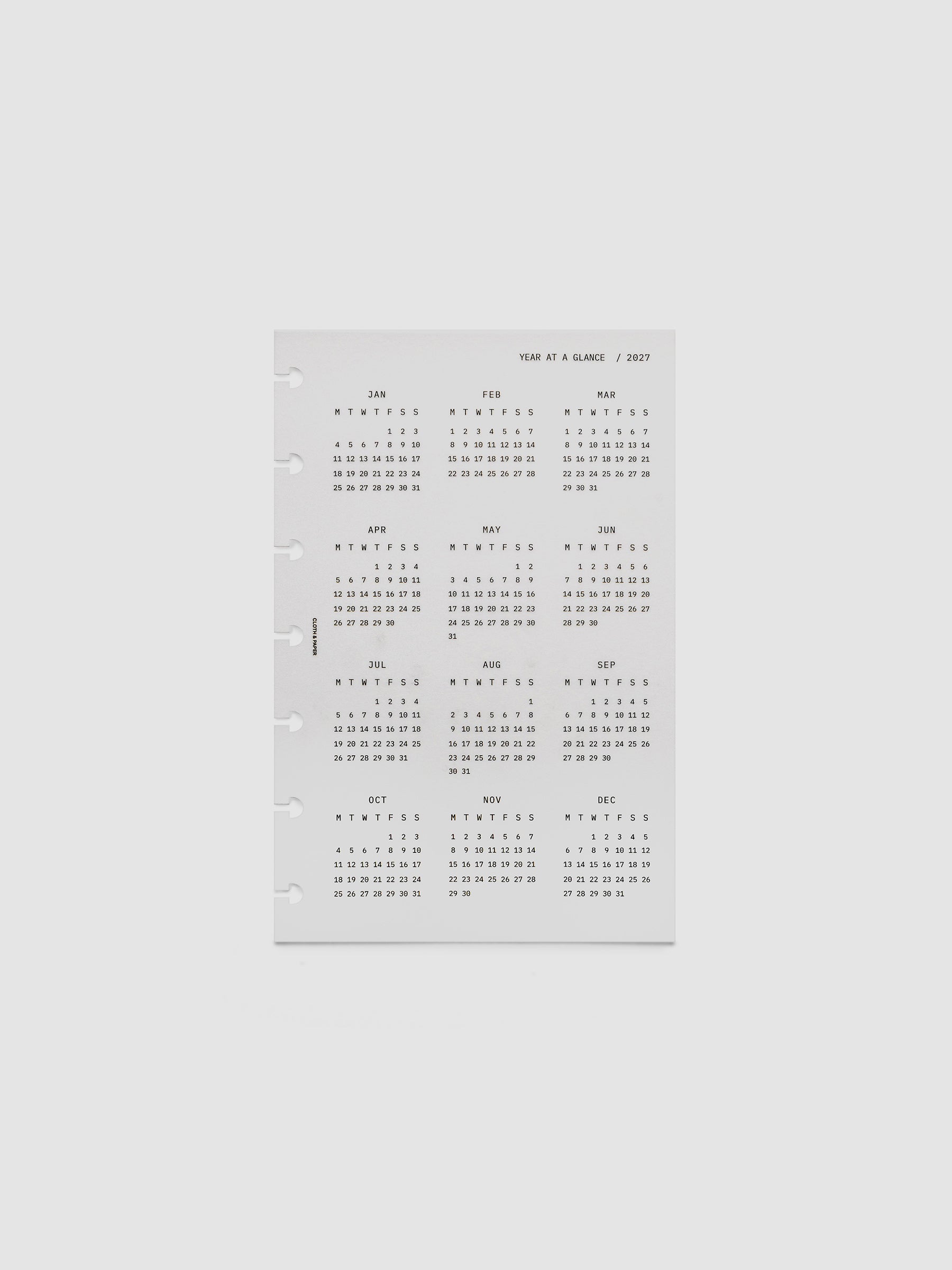 2027 Year At A Glance Dashboard Monday Start, HP Mini 7-Disc Punch, translucent vellum dashboard shown on its own