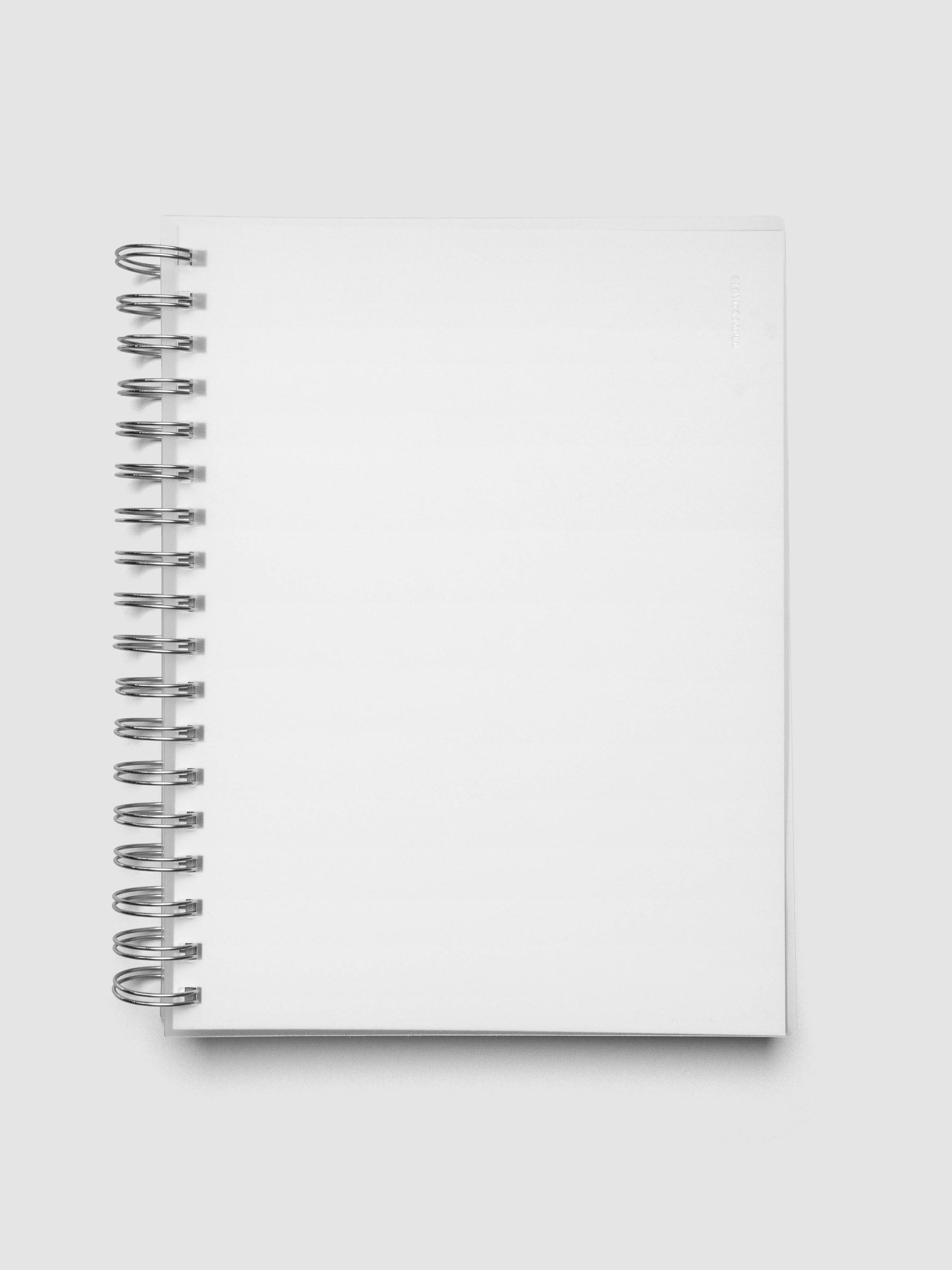Spiral Notebook dashboard in the color Le Blanc shown in size HP Classic inside a notebook.