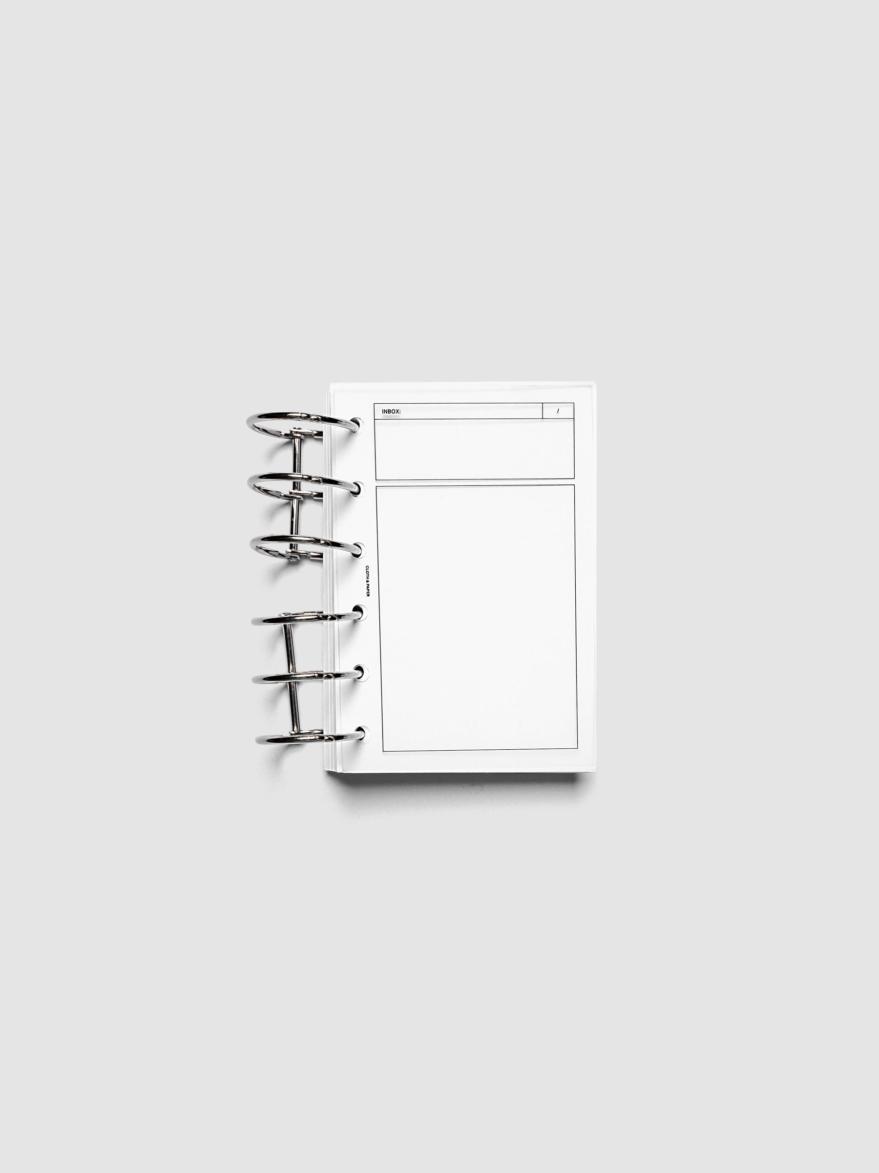 Crystal Clear Inbox Planner Dashboard shown ring bound in a Pocket sized planner.