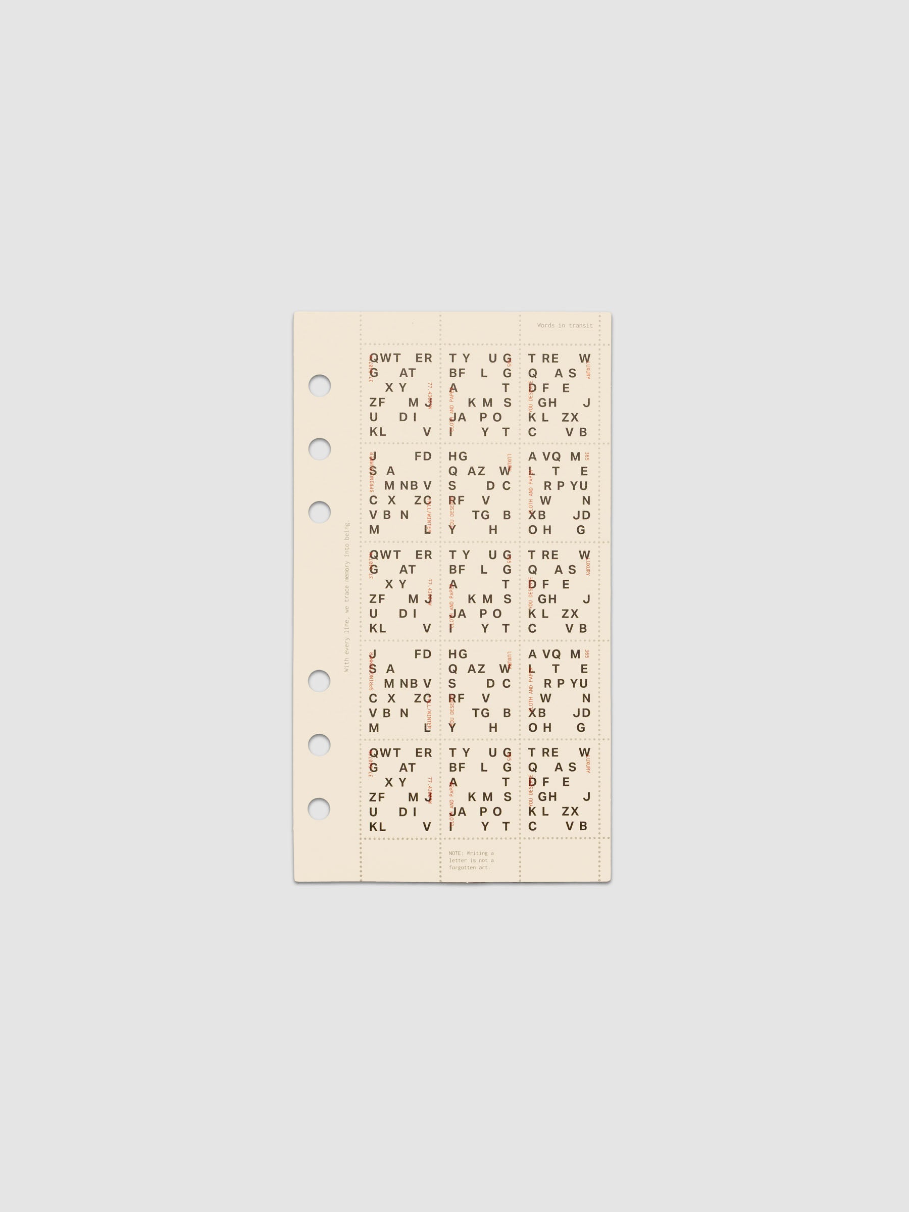 Cream colored Stamp Sheet Planner Dashboard with black text design shown in size Personal against a grey background.