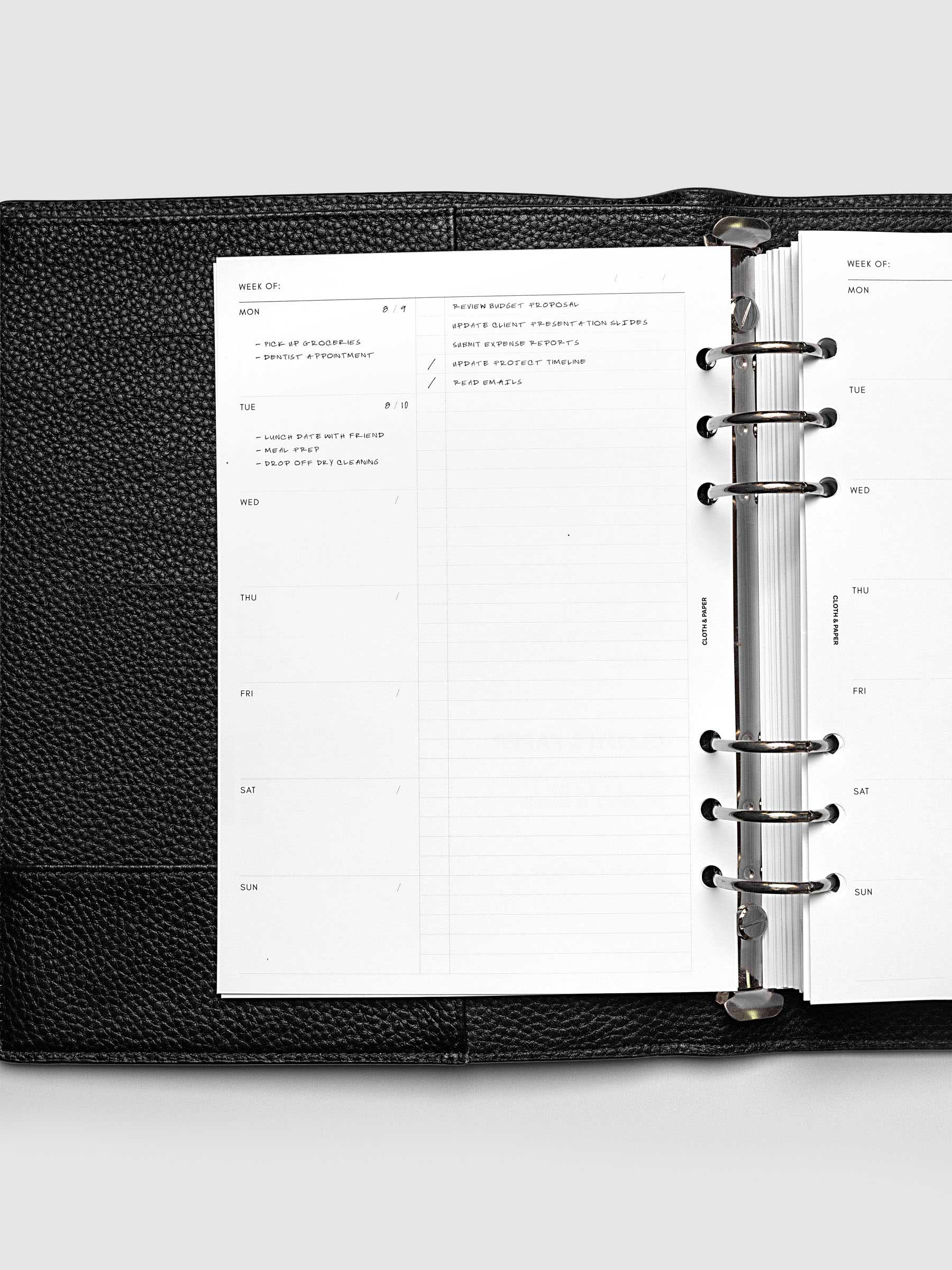 Weekly Checklist Inserts shown inside a black leather agenda in size A5.