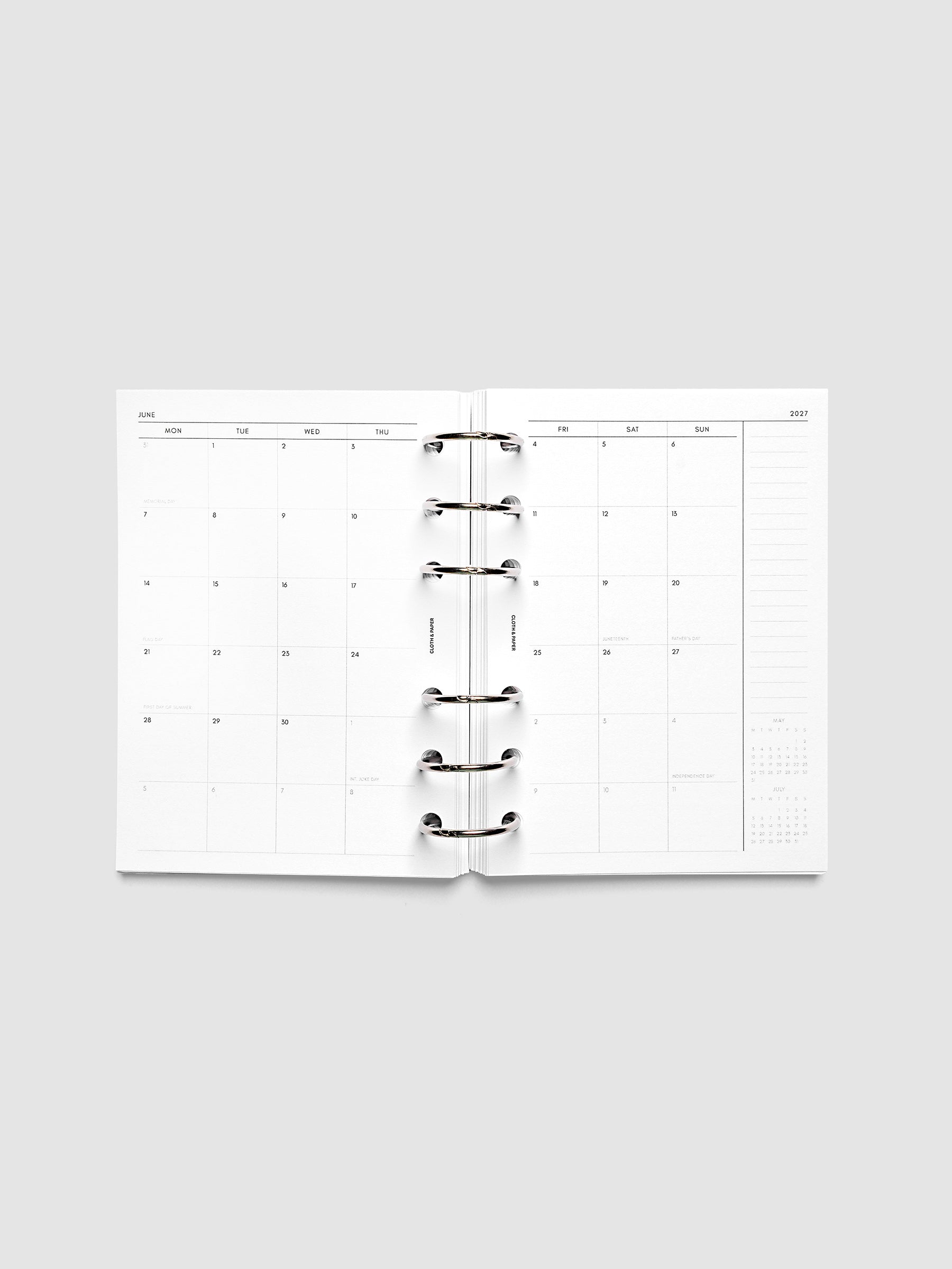 2027 Dated Monthly Planner Inserts, Monday Start, A6 6-Ring Punch, full two-page monthly calendar spread with Monday start, notes column, and mini calendars in the bottom right corner shown inside a planner