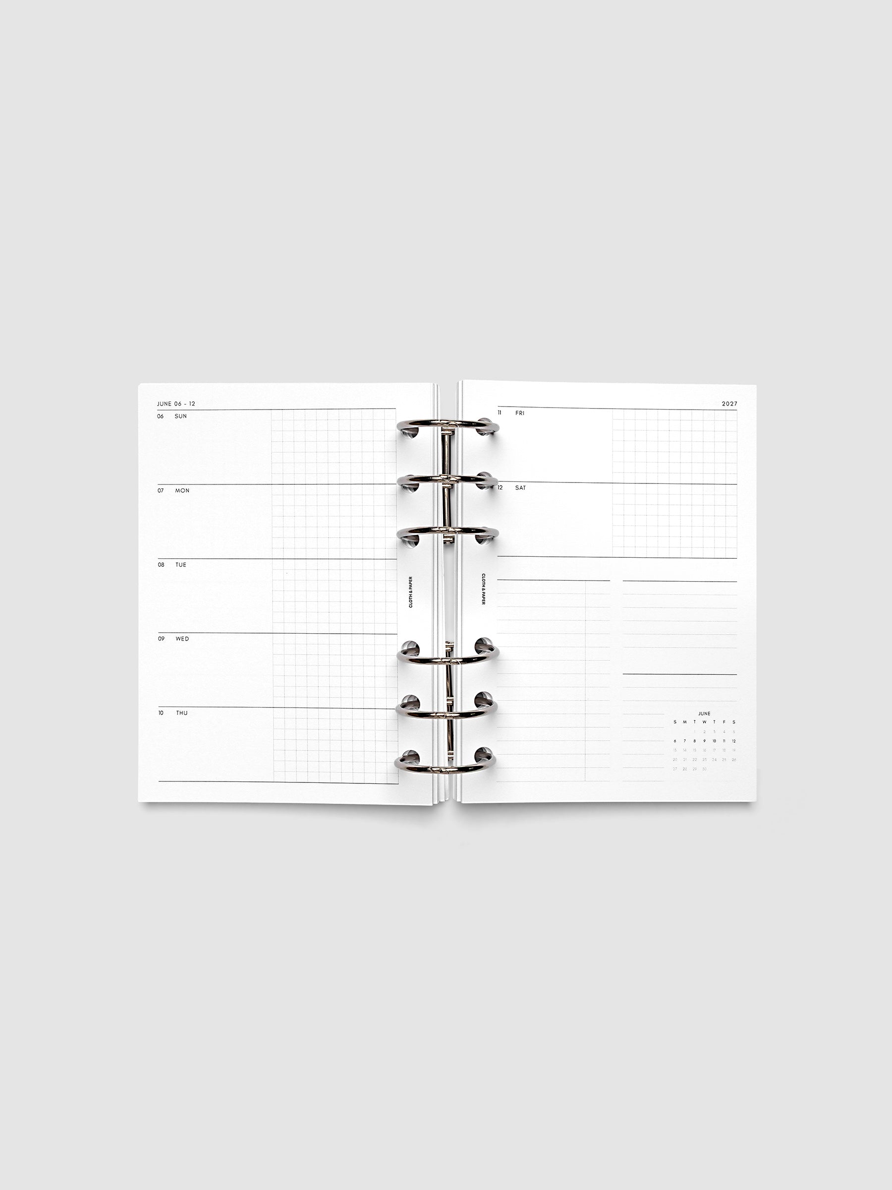 2027 Dated Weekly Horizontal Planner Inserts, Sunday Start, A6 6-Ring Punch, full week-on-two-pages horizontal spread showing each day split into open and graph columns, with tasks column, notes column, and mini monthly calendar on the right page, shown inside a planner