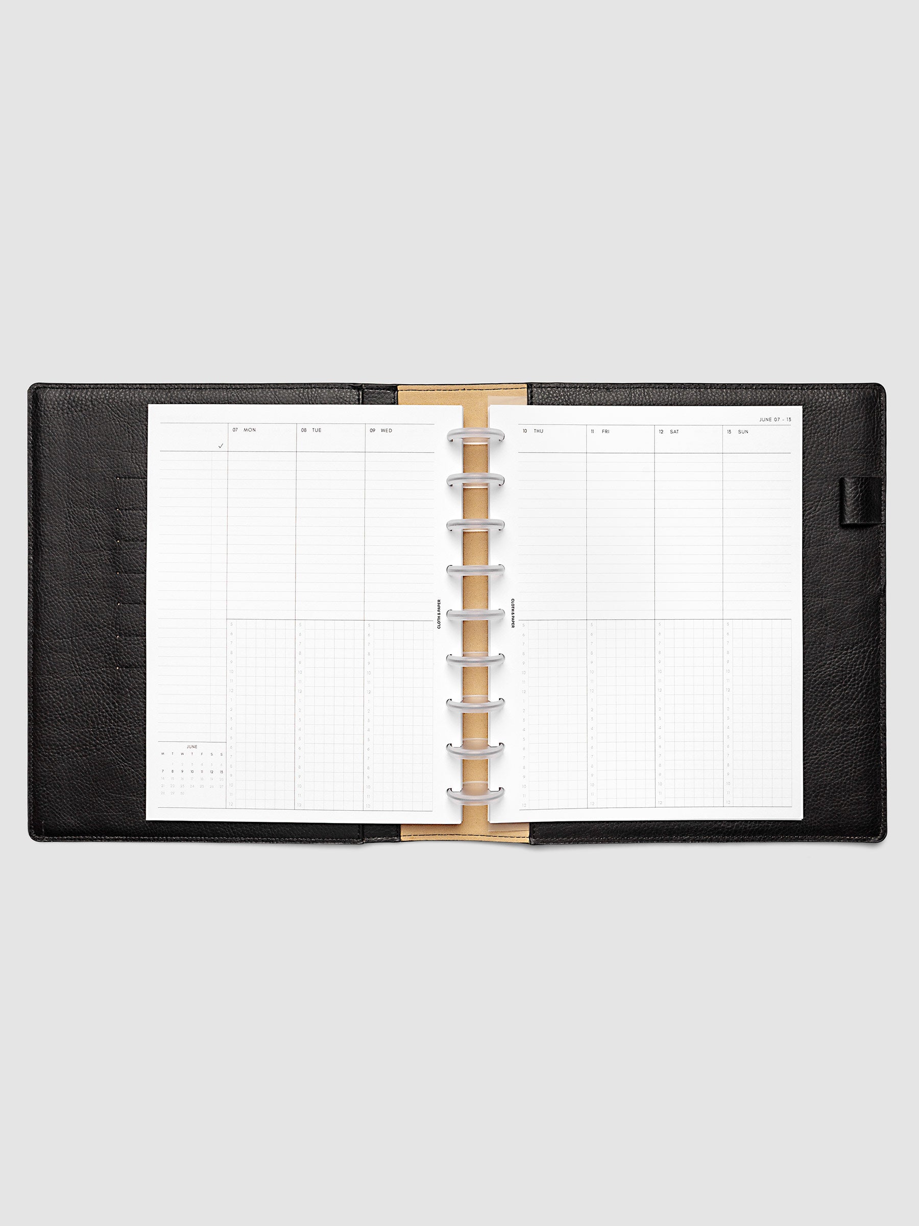 HP Classic 9-Disc Punch weekly time block spread showing left and right pages in a planner