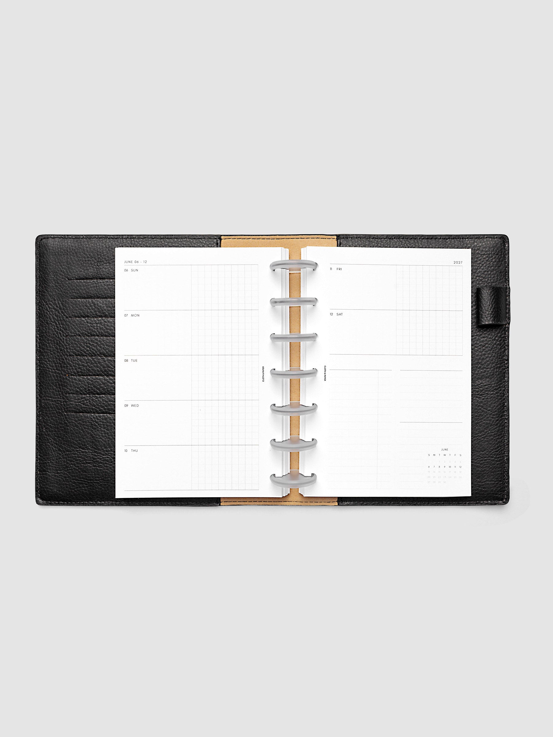 2027 Dated Weekly Horizontal Planner Inserts, Sunday Start, HP Mini 7-Disc Punch, full week-on-two-pages horizontal spread showing each day split into open and graph columns, with tasks column, notes column, and mini monthly calendar on the right page, shown inside a planner