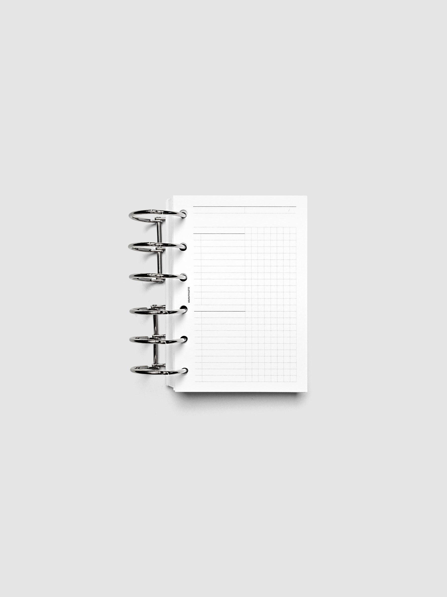 Daily Workflow Planner Inserts, Pocket 6-Ring Punch, right page showing large graph notes section inside a planner
