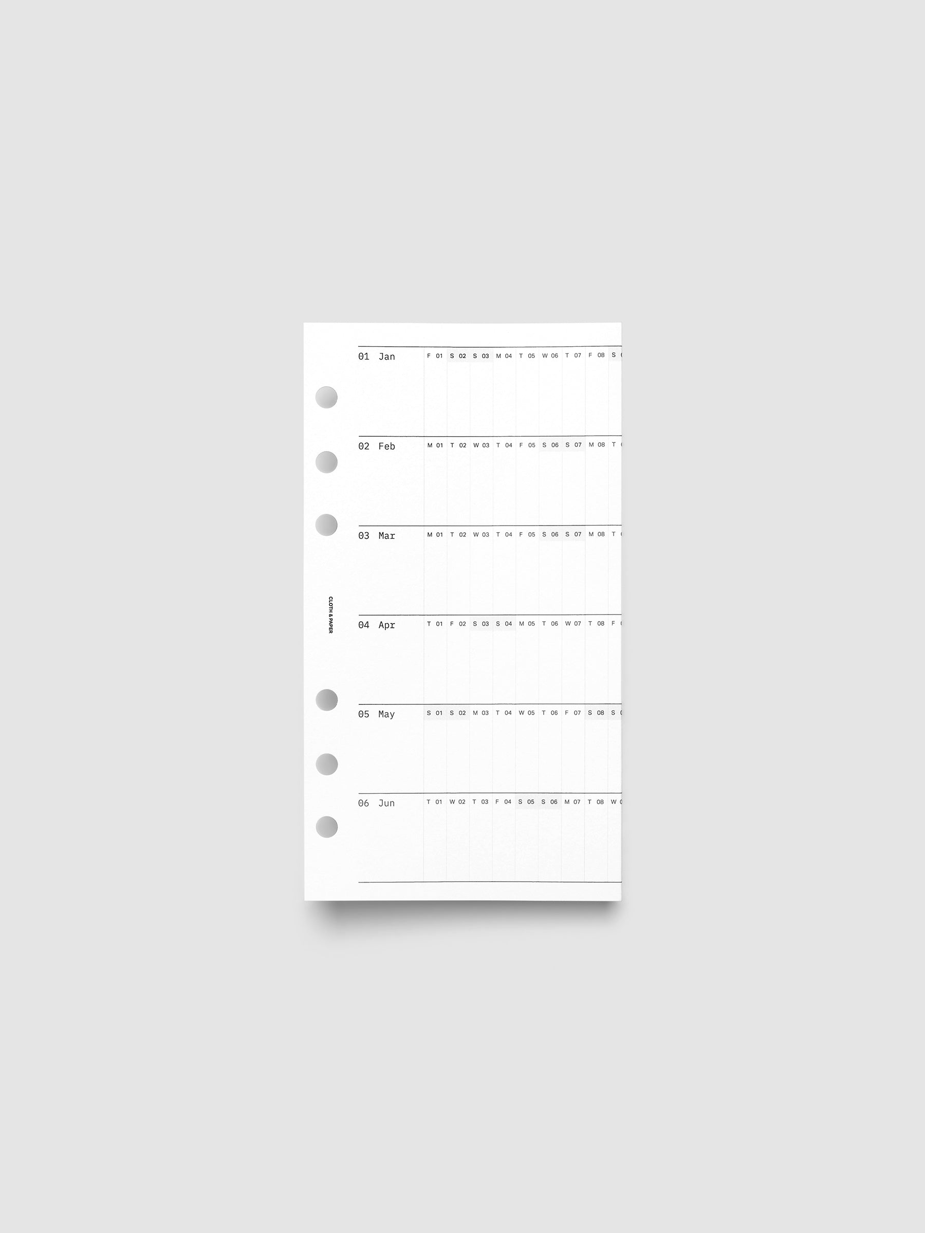 Personal 6-Ring Punch 2027 Dated Fold Out Insert shown folded closed, displaying the cover side on a flat surface.